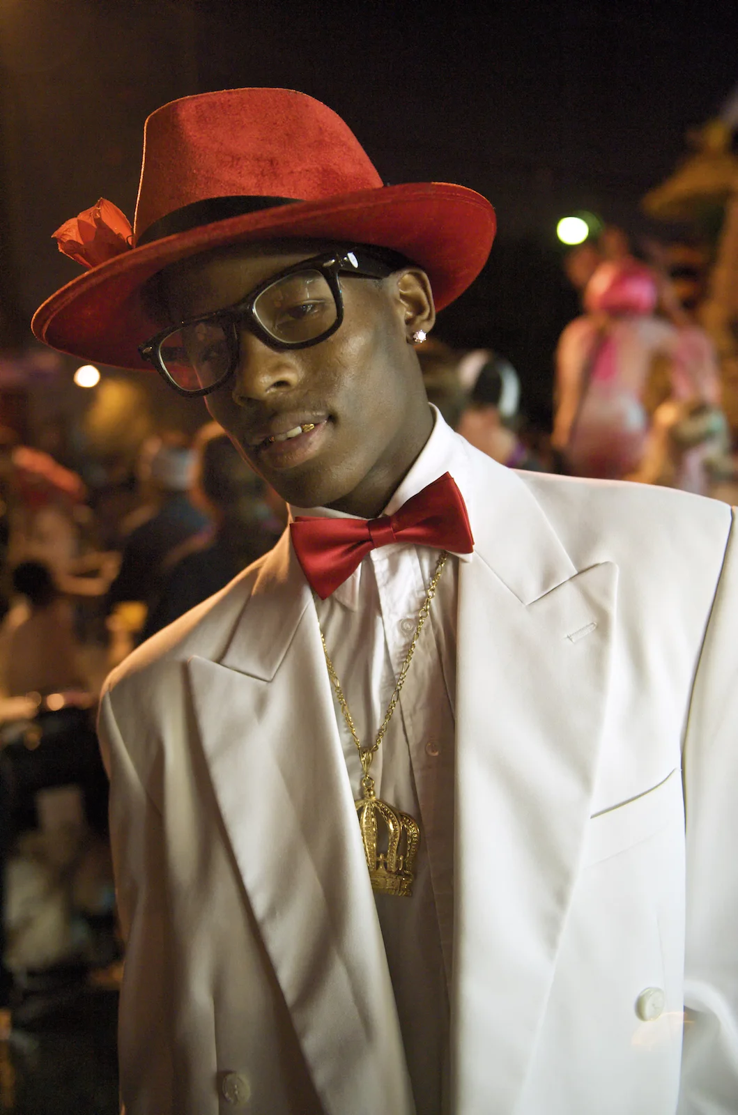 A young man dressed in a bowtie around Mardi Gras in New Orleans. Image by New Orleans based travel photographer, Marc Pagani - marcpagani.com