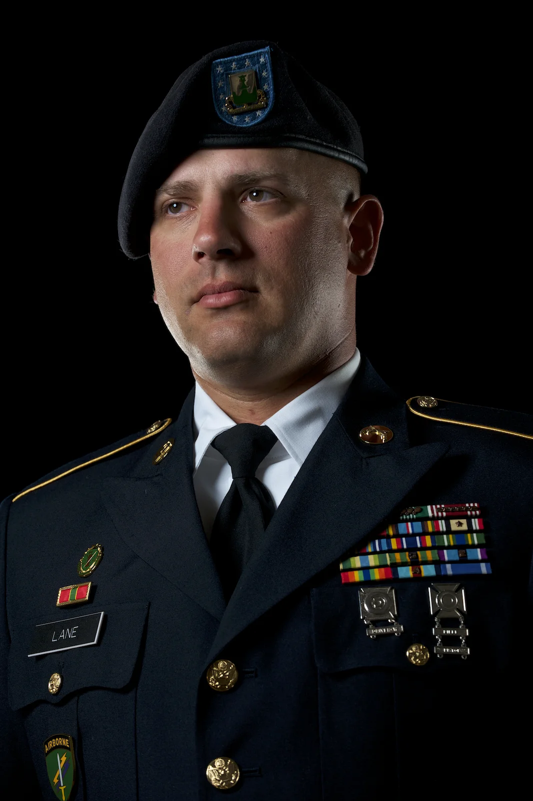 A studio portrait headshot of a soldier in the United States military. Image by New Orleans based portrait photographer, Marc Pagani