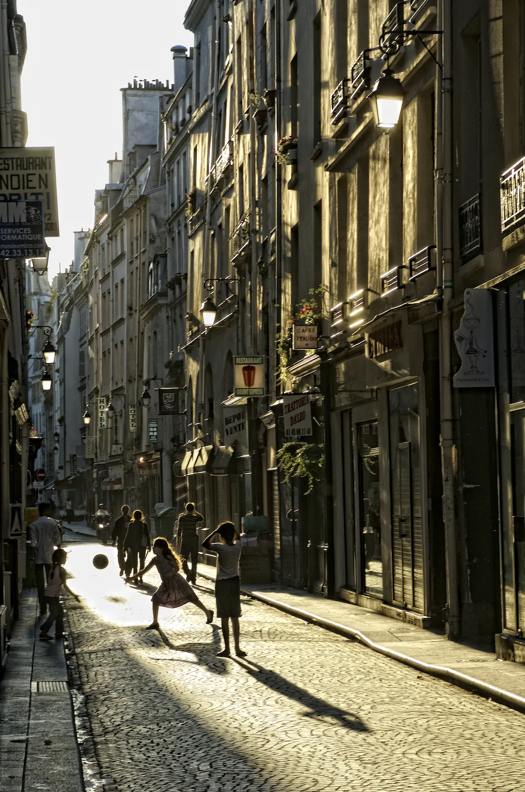 Children play on Rue Saint Sauveur - Paris, France.jpg