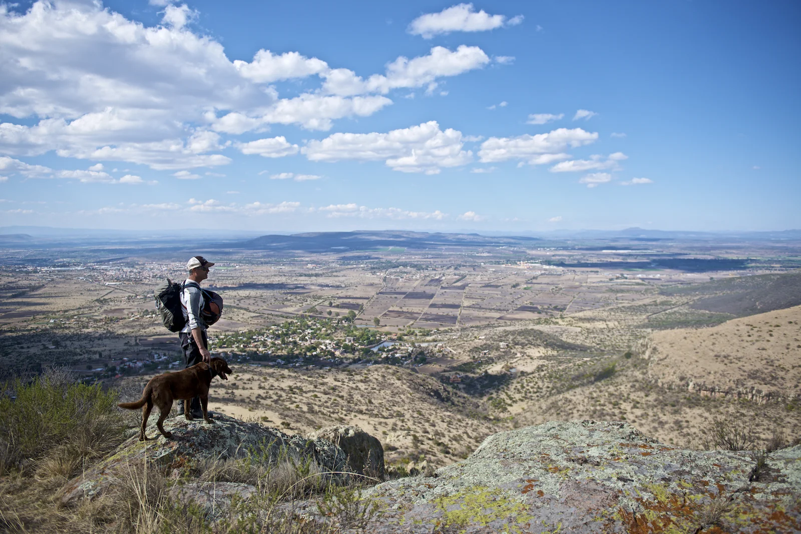 Tom and his dog above San Miguel d'Allende, Mexico. Image by New Orleans based travel photographer, Marc Pagani