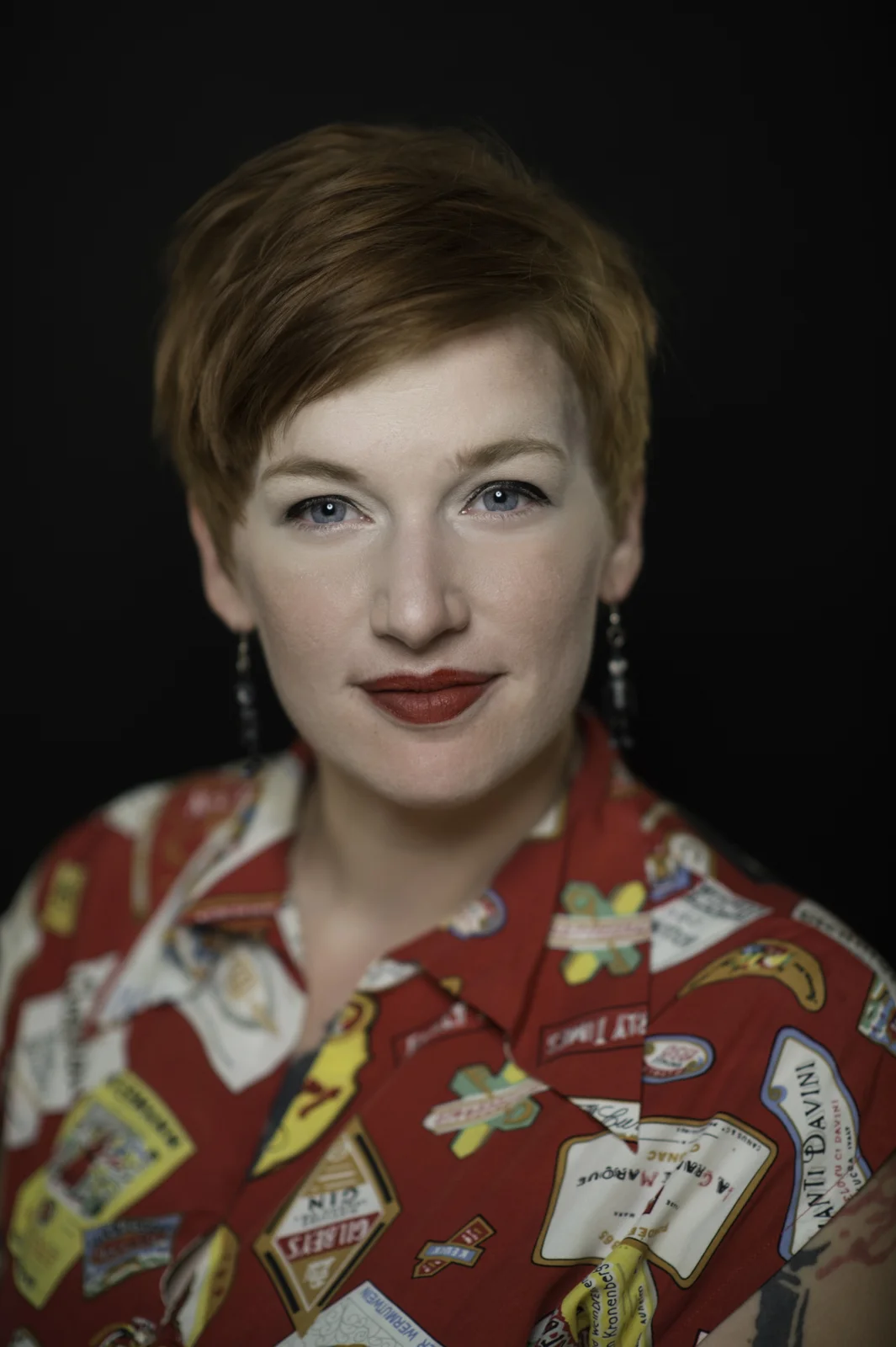A studio portrait headshot of Andrea Heming. Image by New Orleans based portrait photographer, Marc Pagani