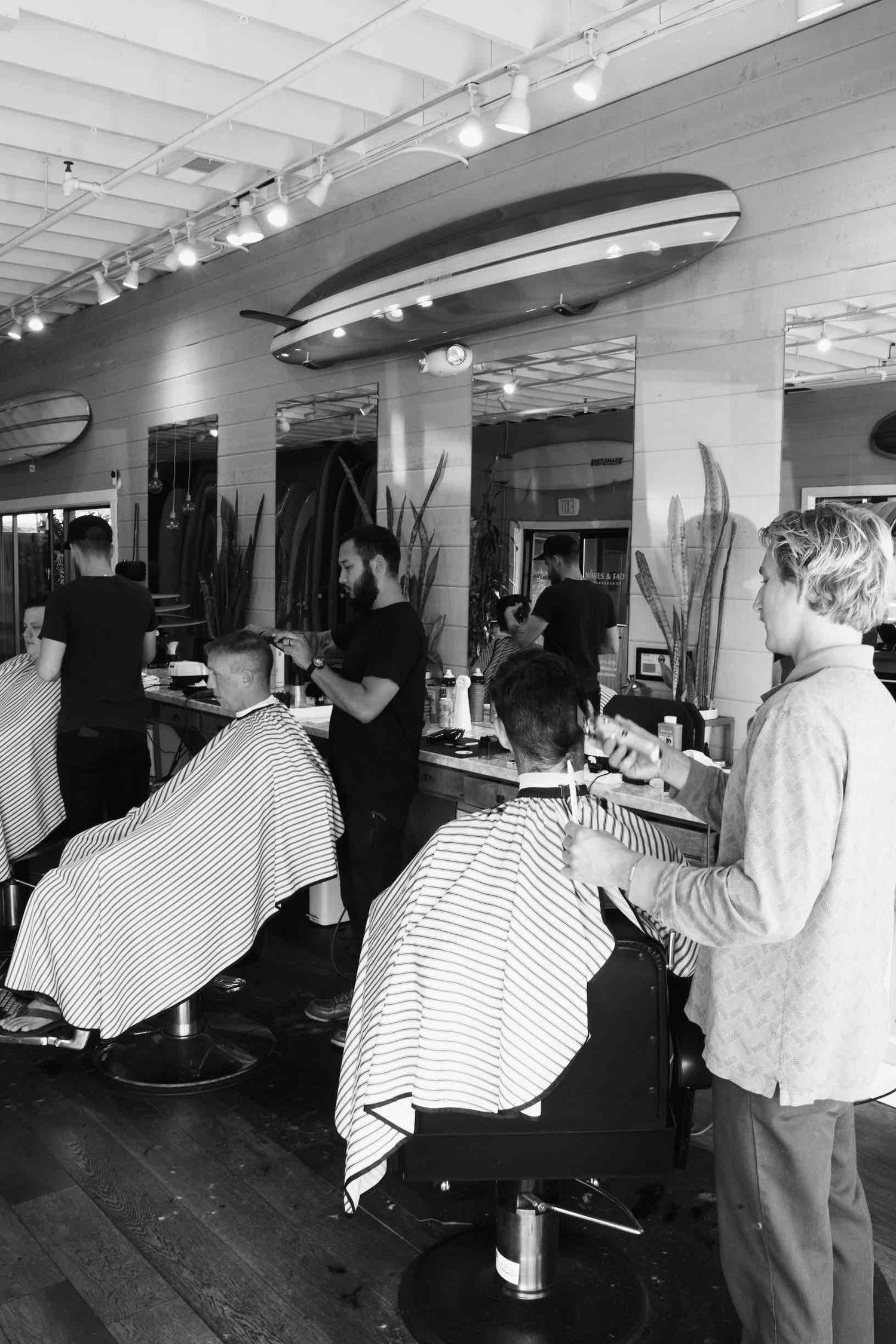Customers In Local Barber Shop Stock Photo - Download Image Now