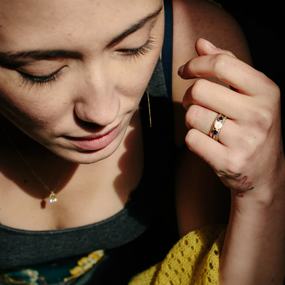05 catkin circle ring with sapphire drops on model.jpg