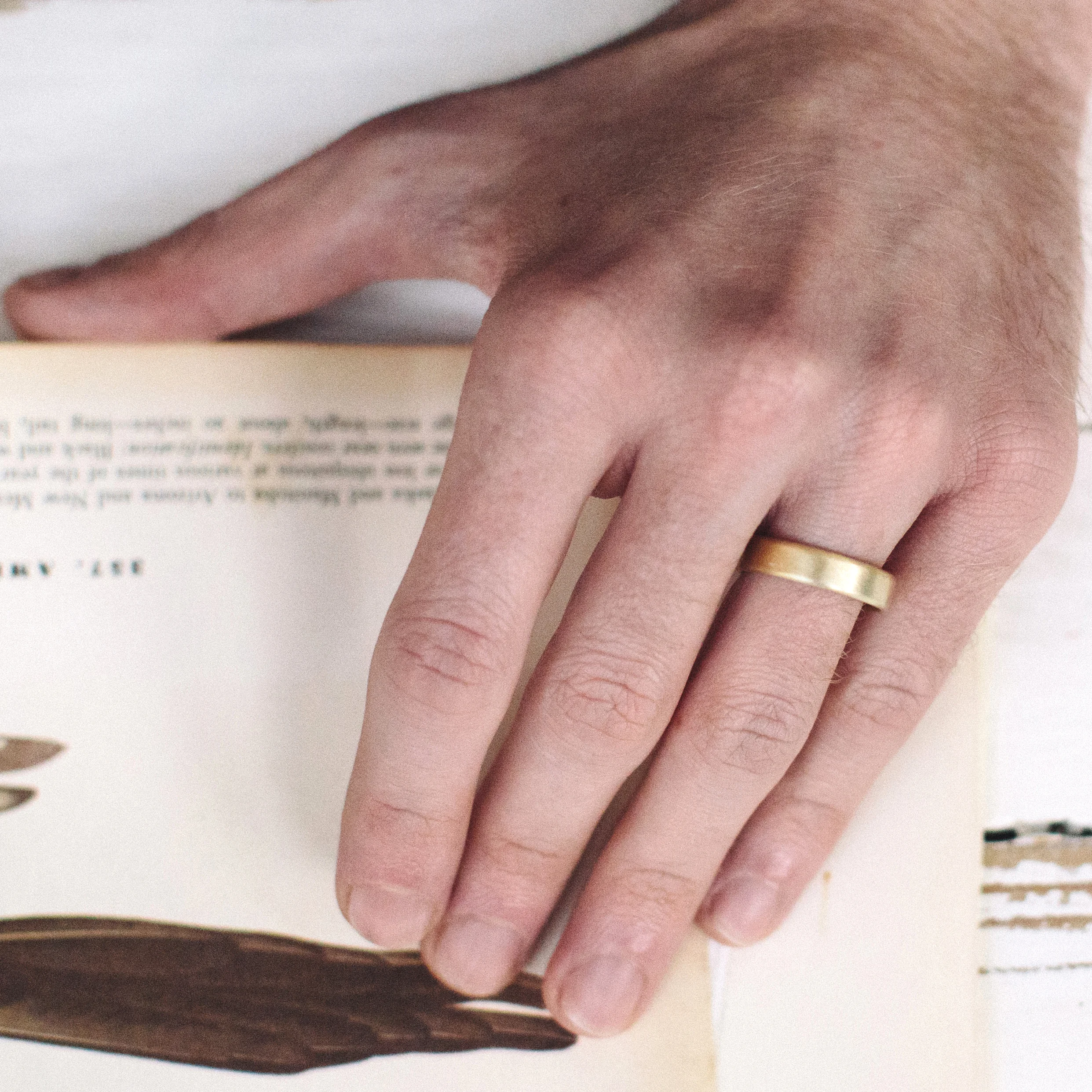 27 gents pillow wedding ring on model.jpg