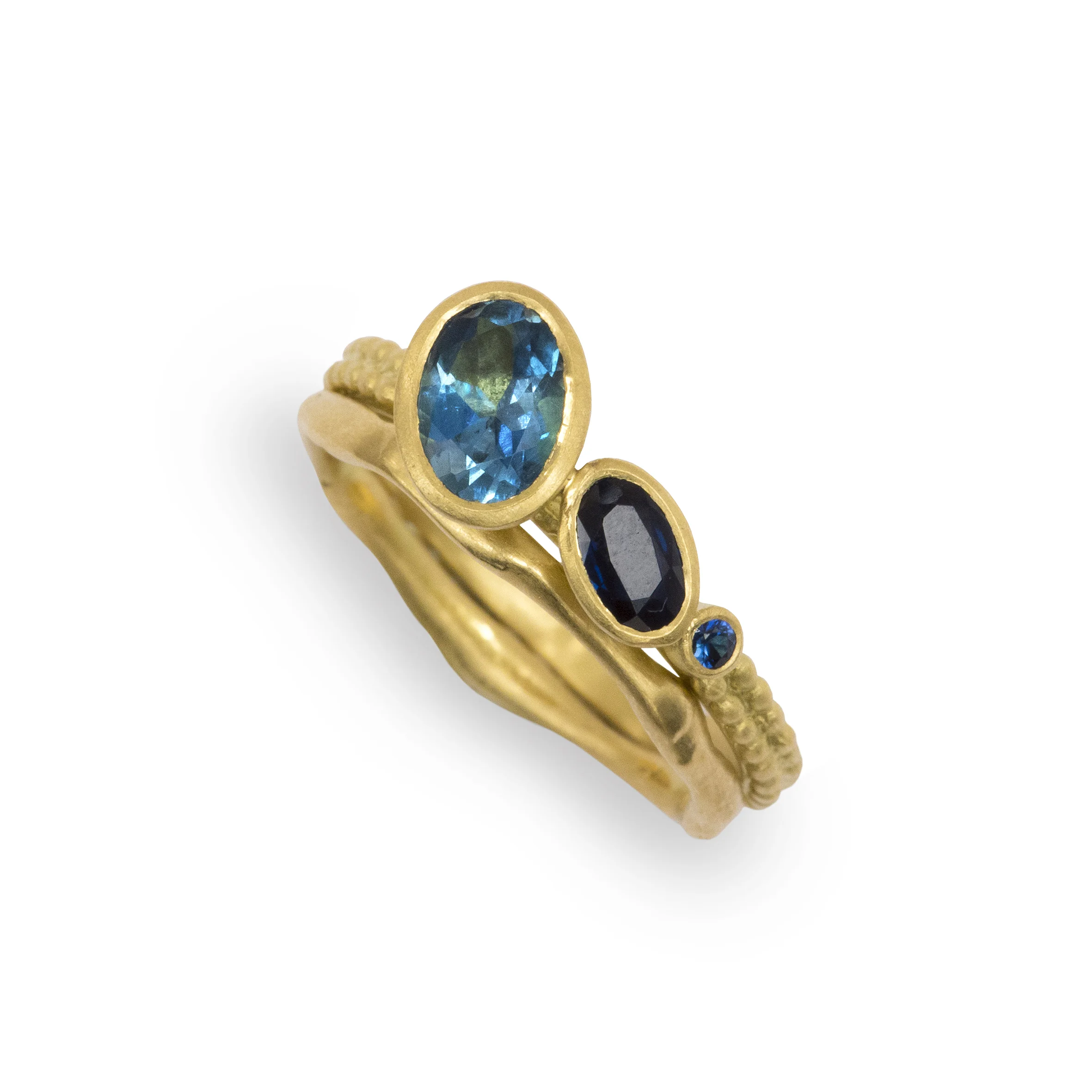 33 off-set aquamarine and sapphire coupled dotty ring in stack.jpg