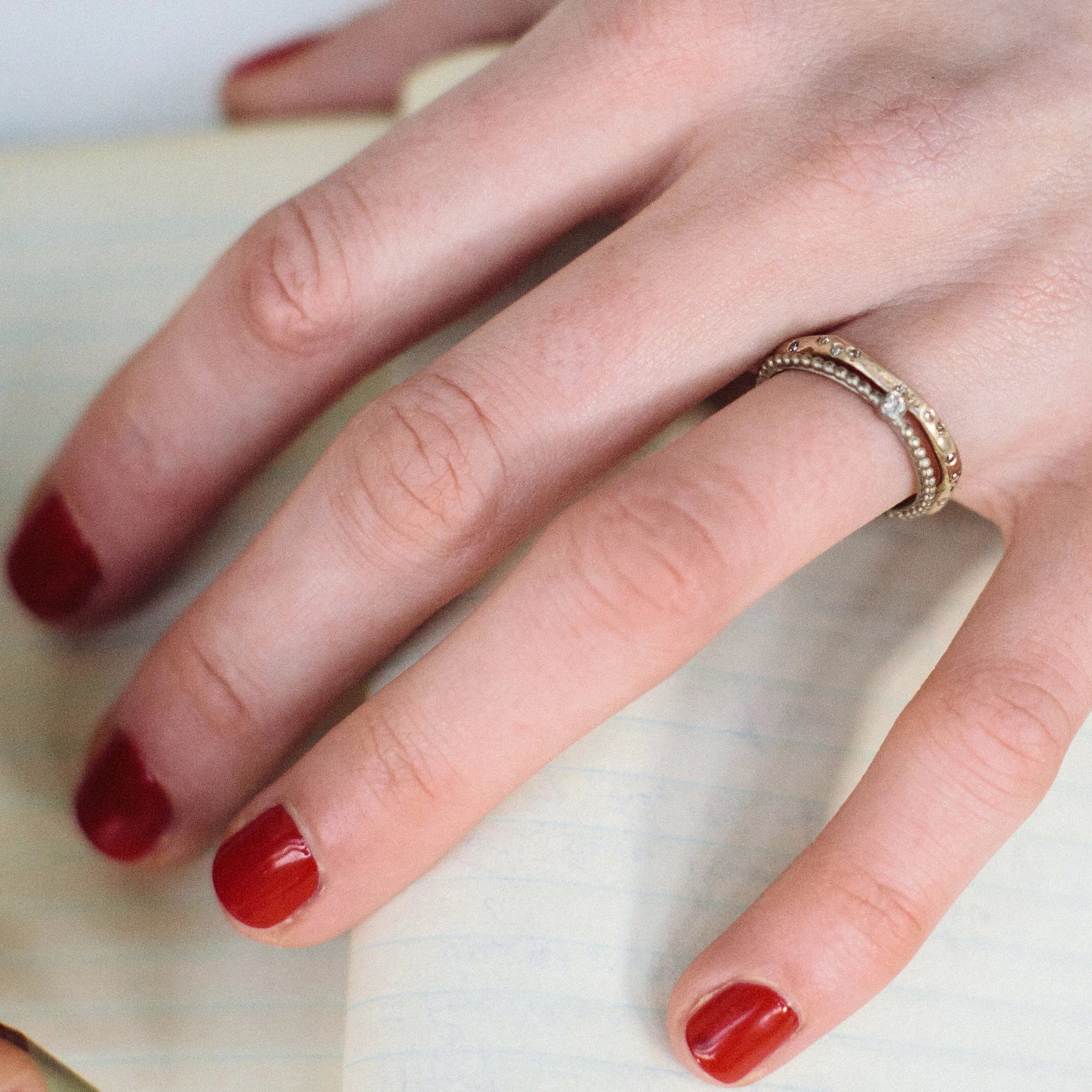 35 sculpted scatter ring on model 1.jpg