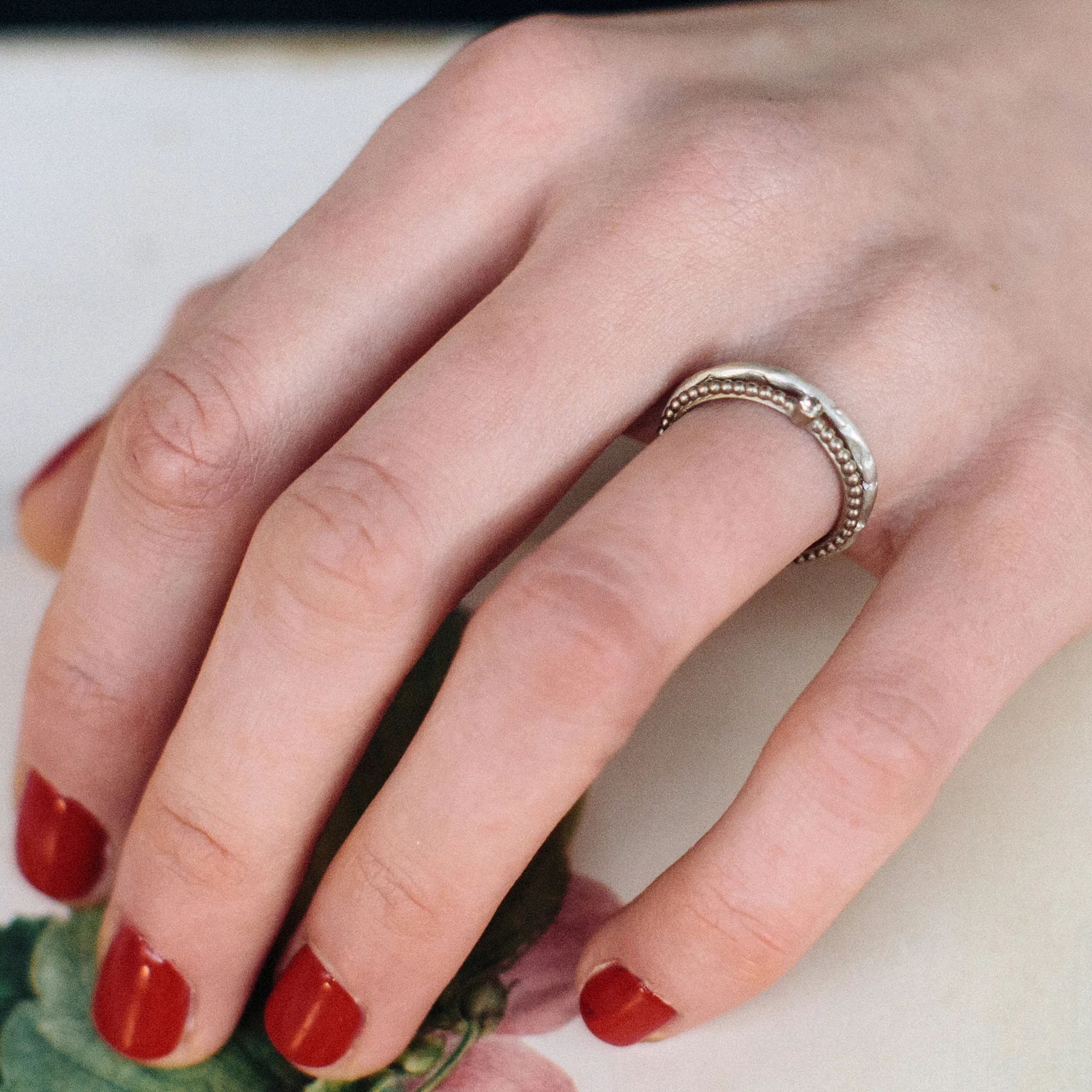36 sculpted wedding ring on model.jpg