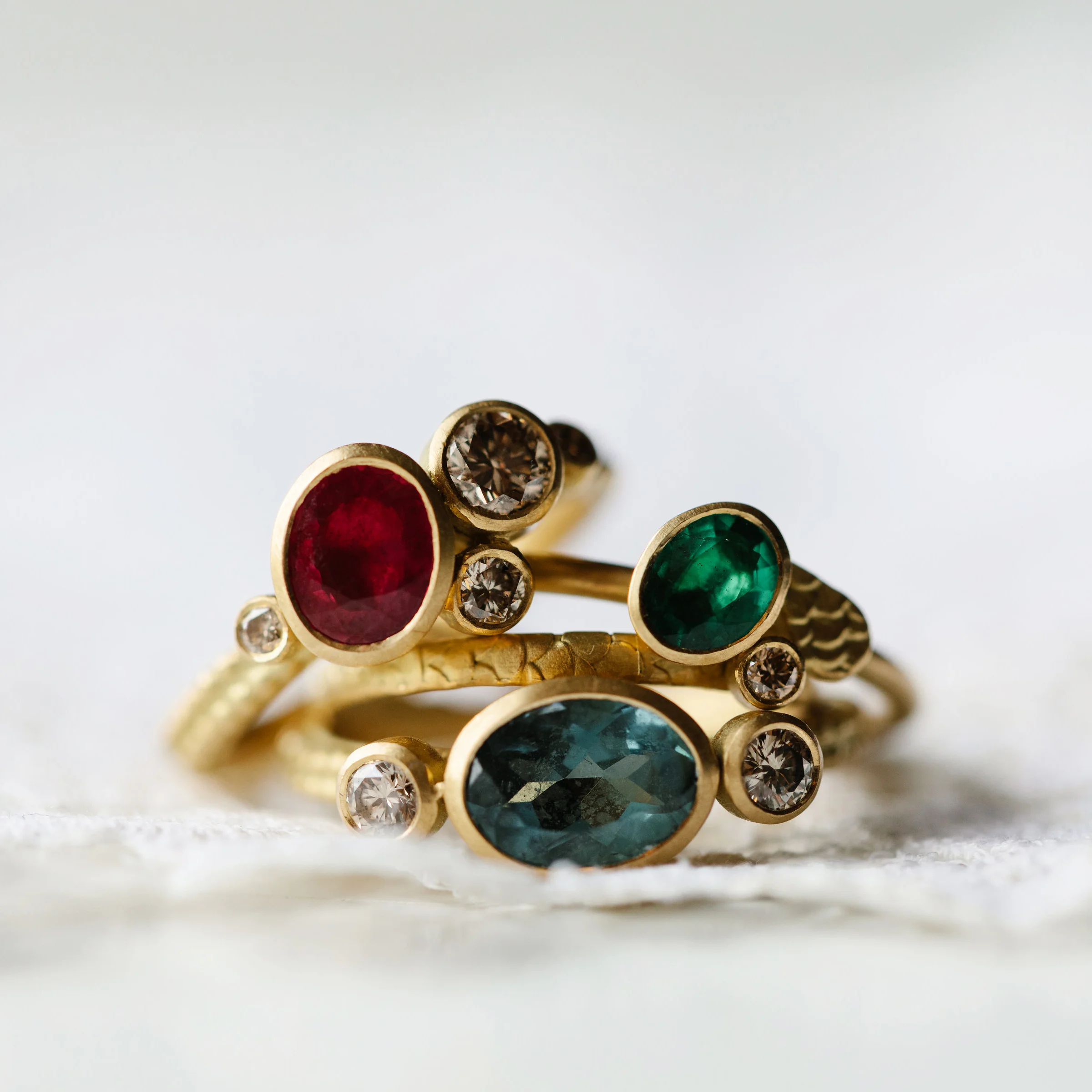 CATKIN EMERALD DROPLET RING IN GROUP.jpg