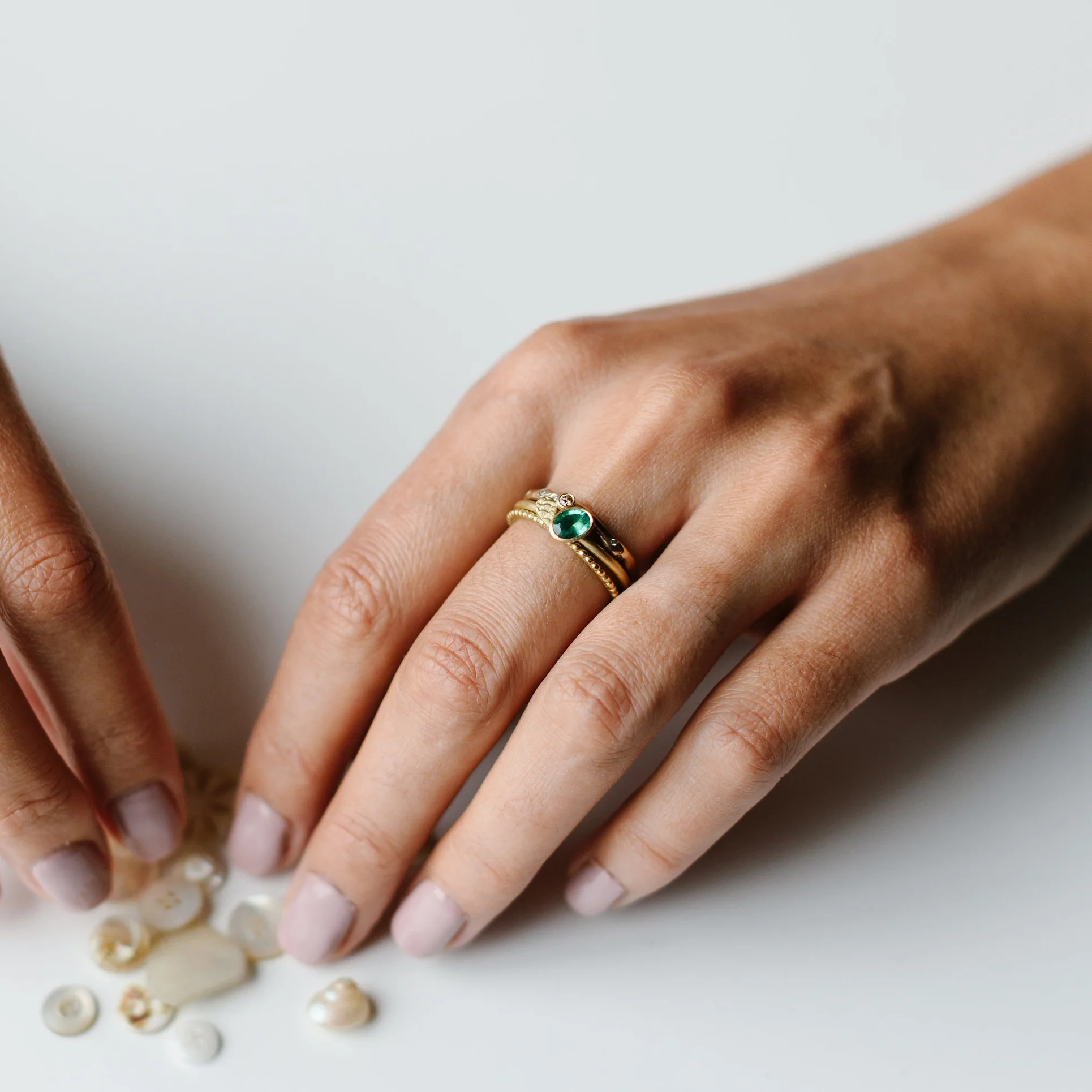 CATKIN EMERALD DROPLET RING on model.jpg