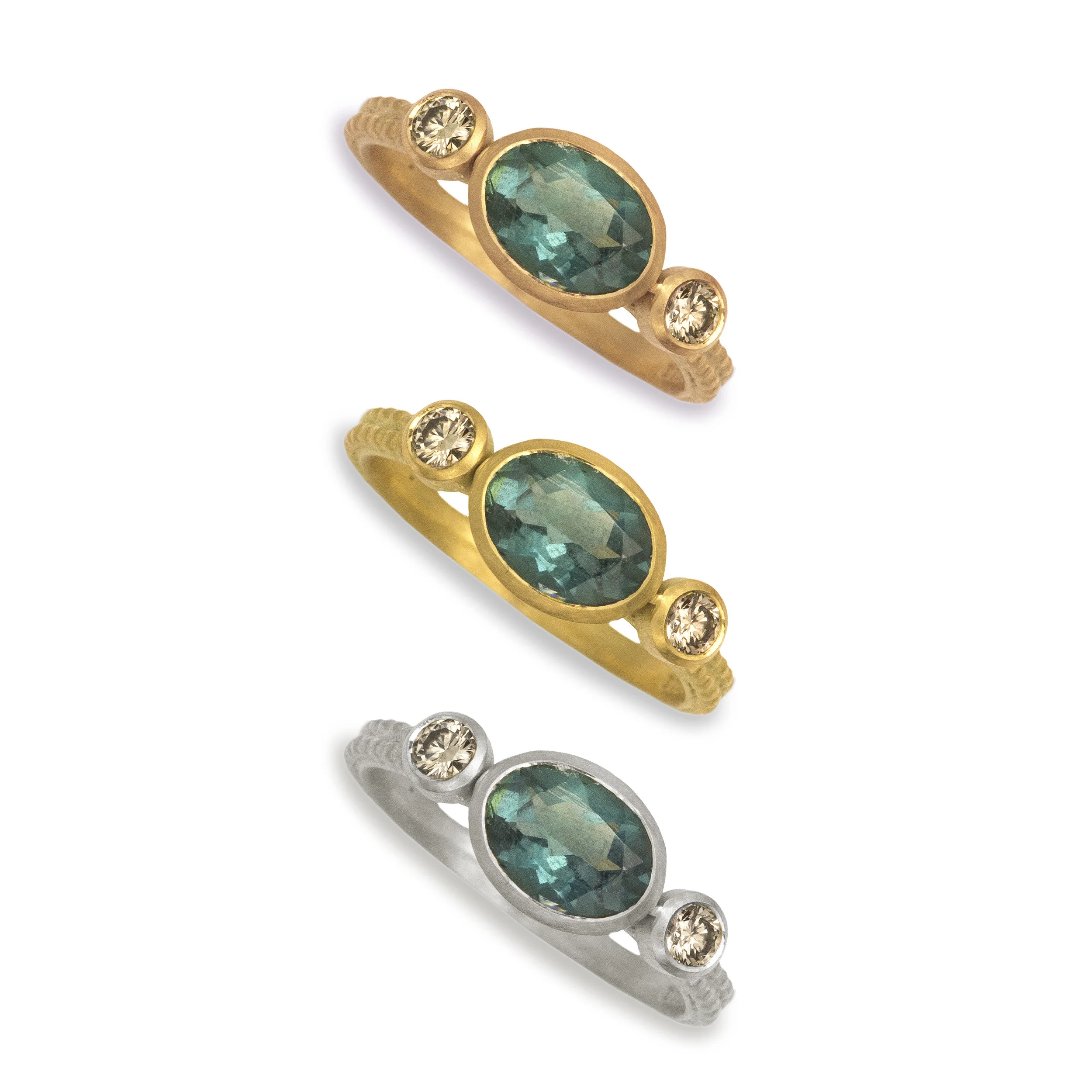 LARGE OVAL BLUE TOURMALINE COUPLED DOTTY RING METALS.jpg