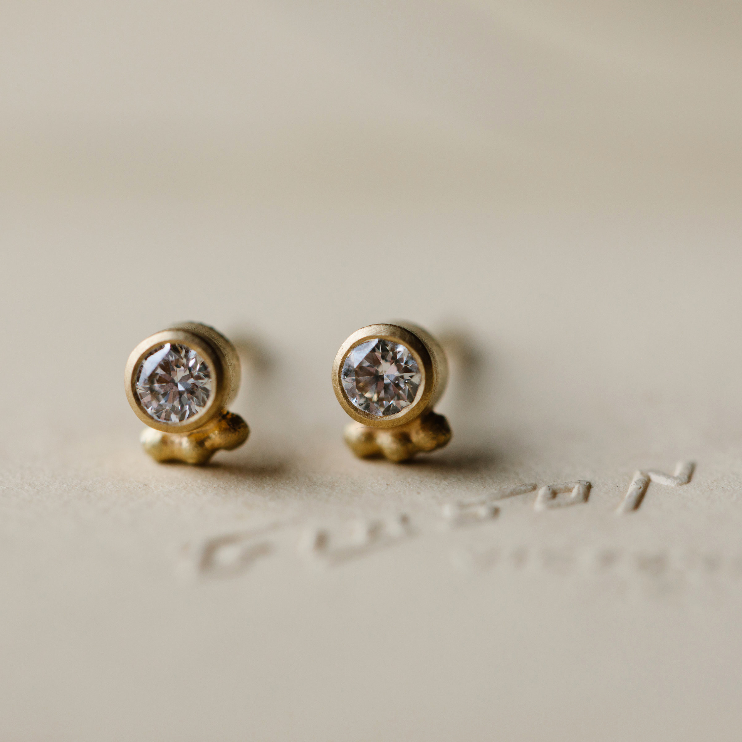 TINY DOTTY DIAMOND STUDS STYLED.jpg