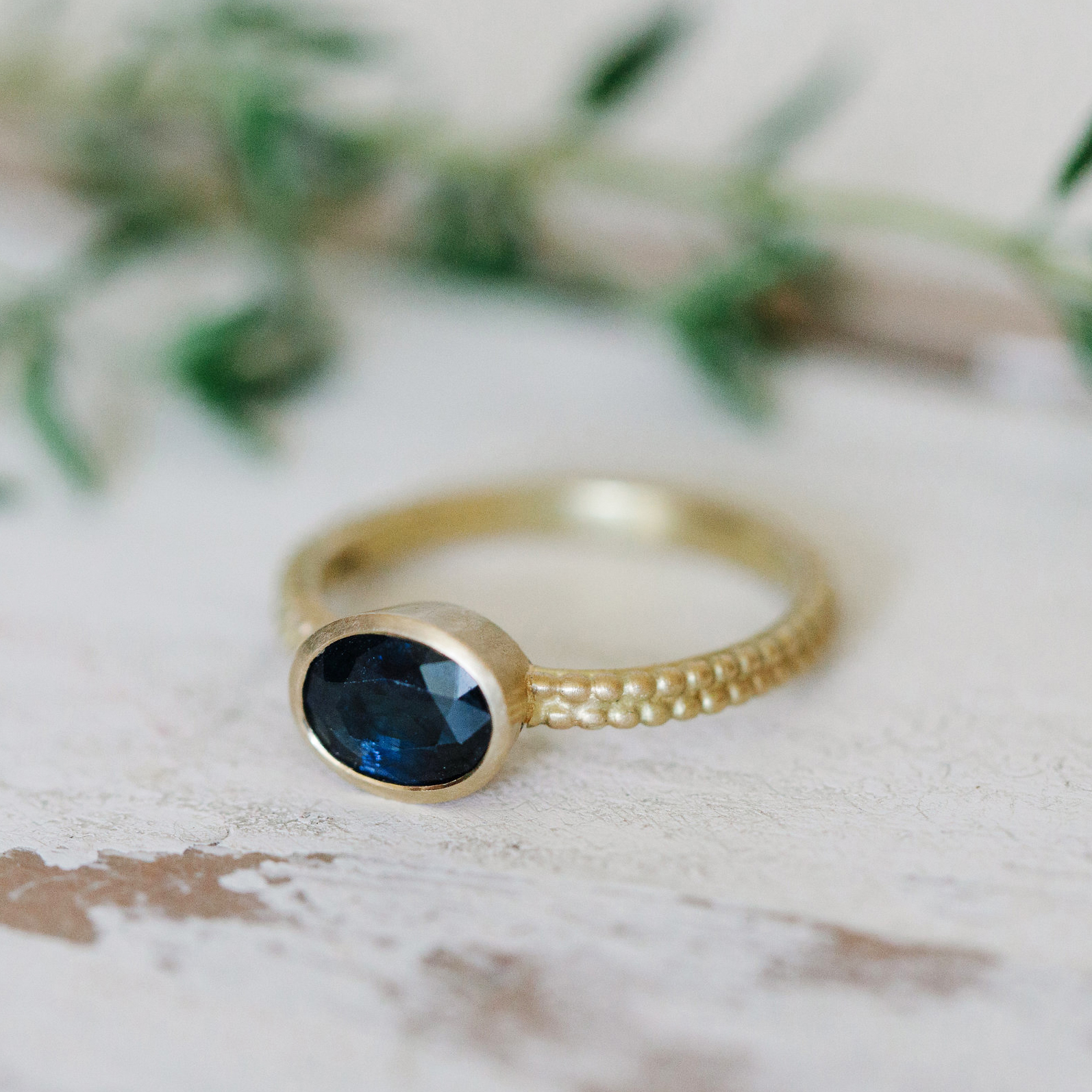 31 Madagaskan sapphire Coupled Dotty Ring main.jpg