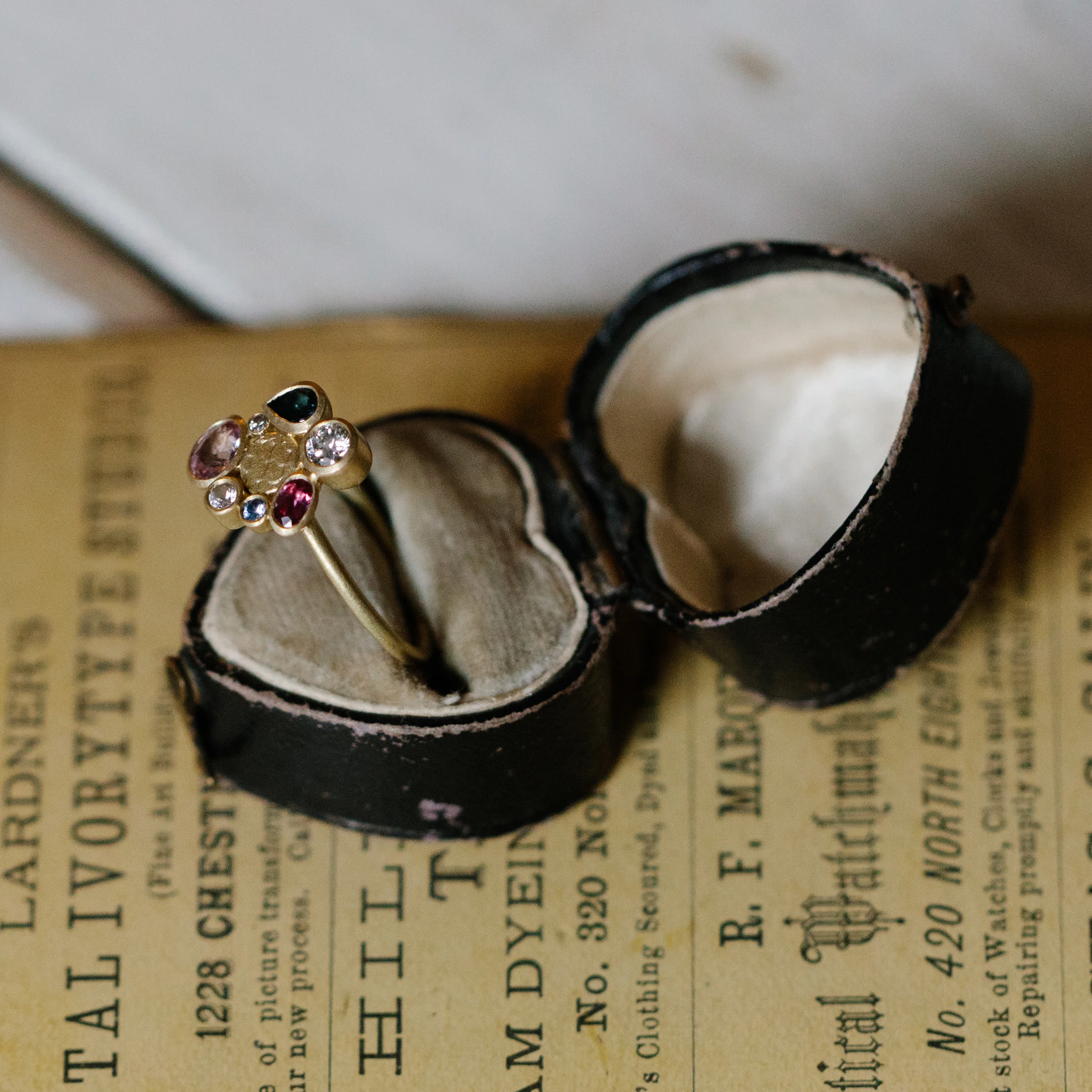 Catkin happenstance halo ring styled 2.jpg