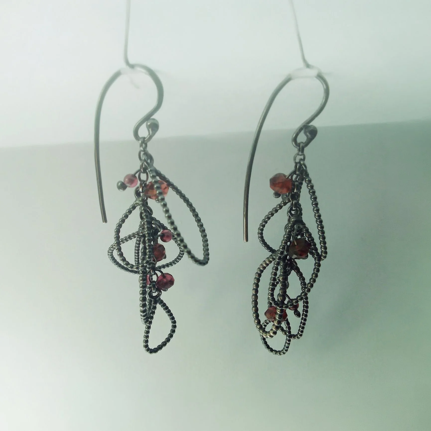 Silver and garnet dangley earrings