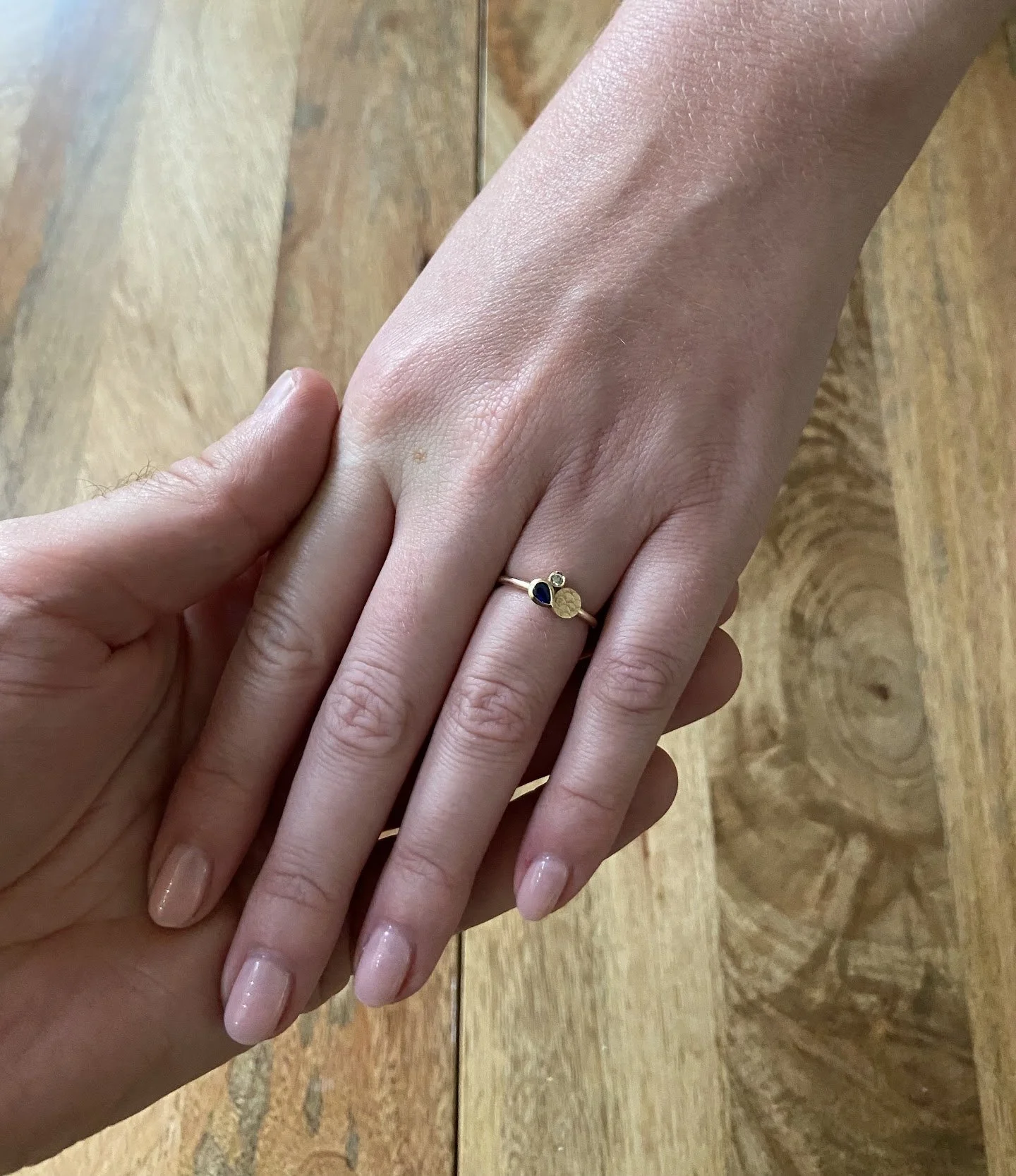 Gemstone and gold engagement ring