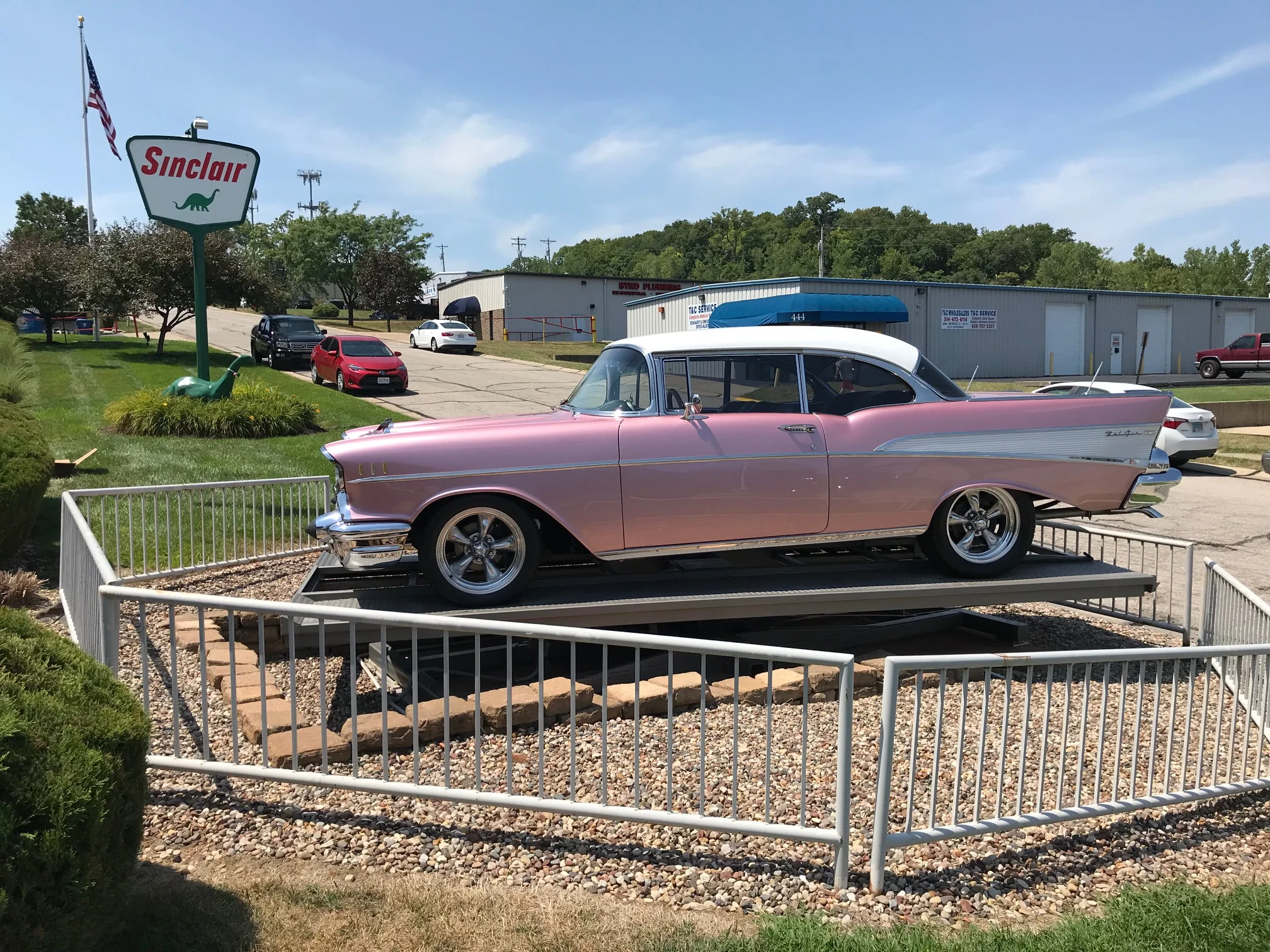 A '57 Chevy rotates between the two showrooms at Fast Lane classic cars.