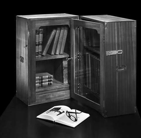 Folding Campaign Bookcase: Sapele with a finish of shellac and black wax
