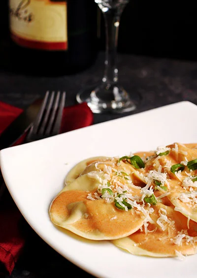 Lobster Ravioli with Champagne Cream Sauce