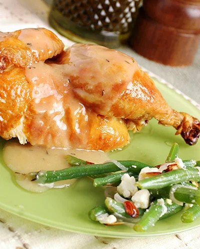 Roasted chicken with feta-almond green beans