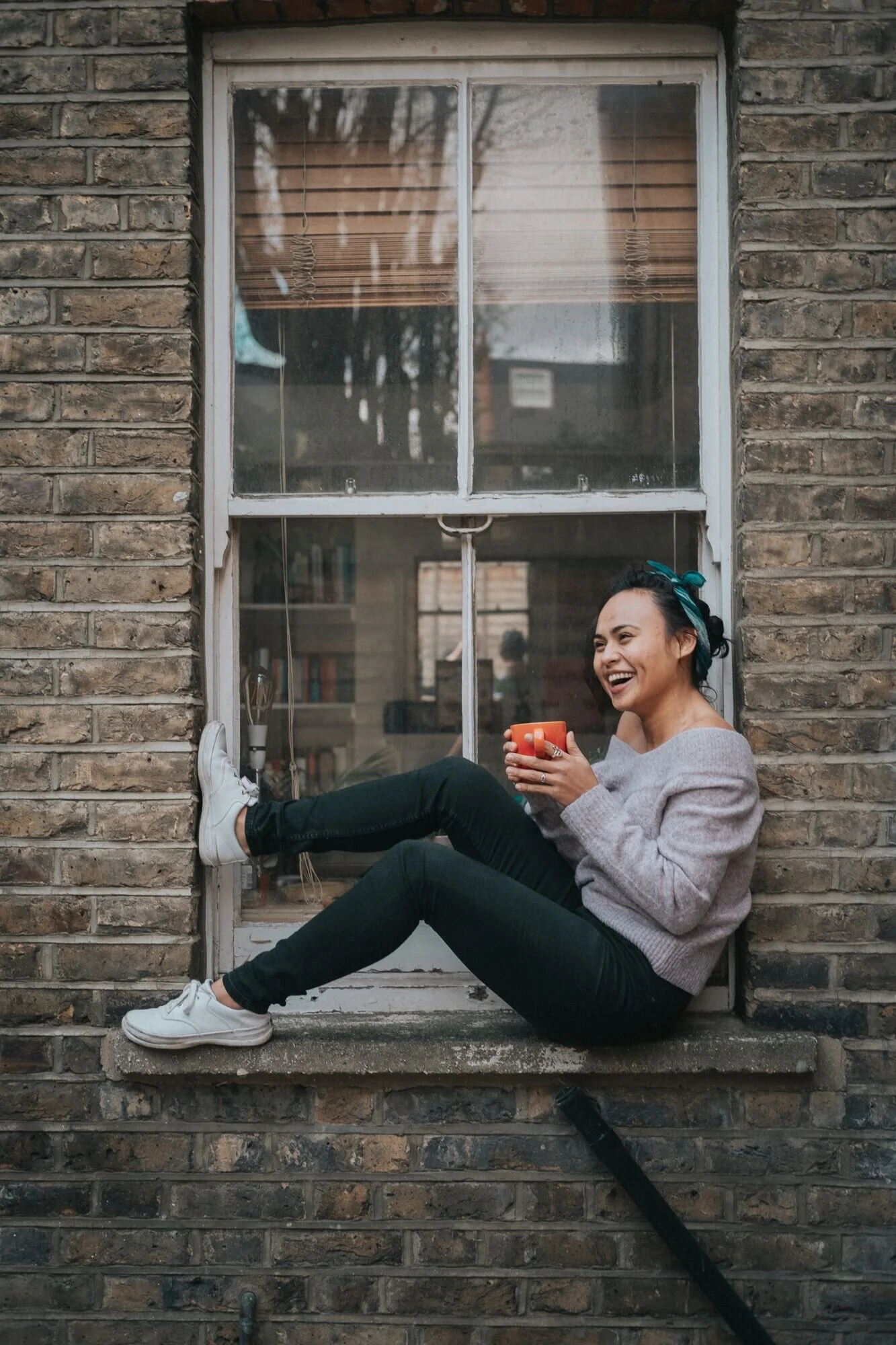 You know casually sitting in the window frame… this is totally, very comfortable. Yup.