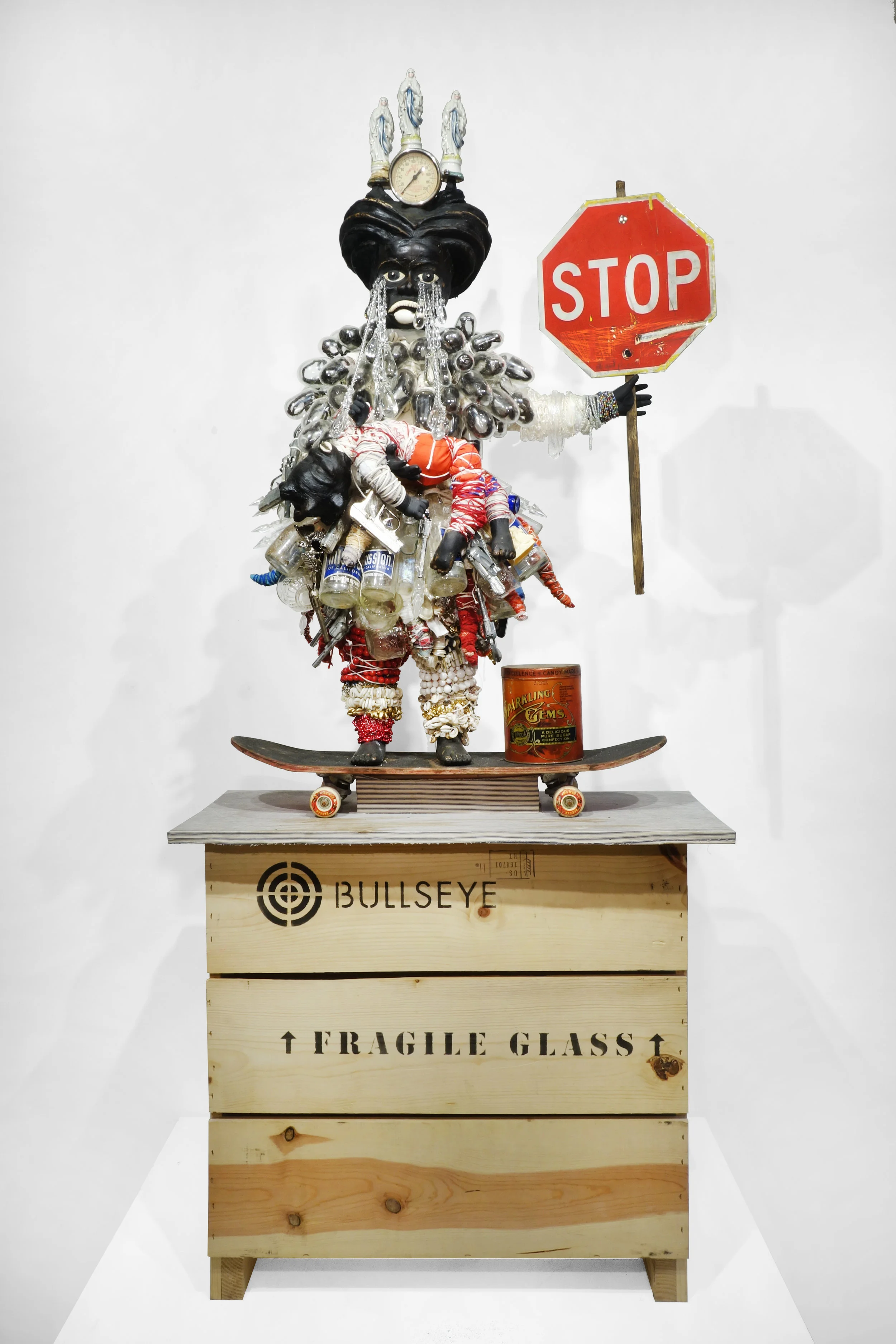 So many many dead black bodies, or, the why niggas always gotta be shootin' when they get mad, or take your beef outside, or, the trauma stays and stays and stays, or once again, the derivative ____ makes a mockable, public spectacle of her grief, 2014, Mixed-media assemblage, 48 x 60 x 30 inches, © Vanessa German, courtesy of the artist and Pavel Zoubok Gallery, New York.