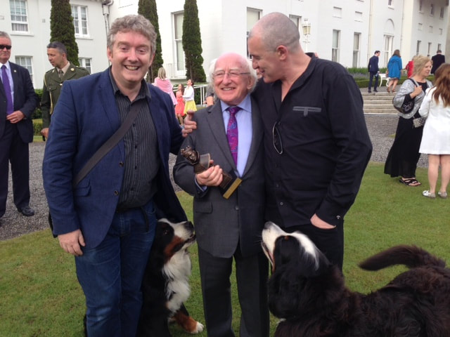 President Higgins congratulating Fishamble’s Jim Culleton and Pat Kinevane on their Olivier Award win