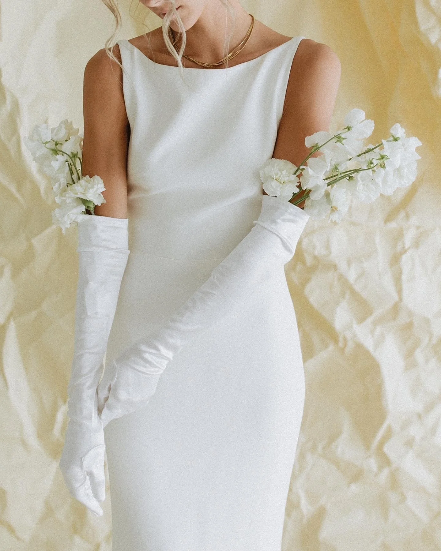 Viola wedding dress by @alexandragrecco styled with long satin gloves created the chicest combination. 

We love a long satin glove and have some options for you at Zo &amp; Willow. Book an accessory fitting appointment to try them on. 

Photo by @bl