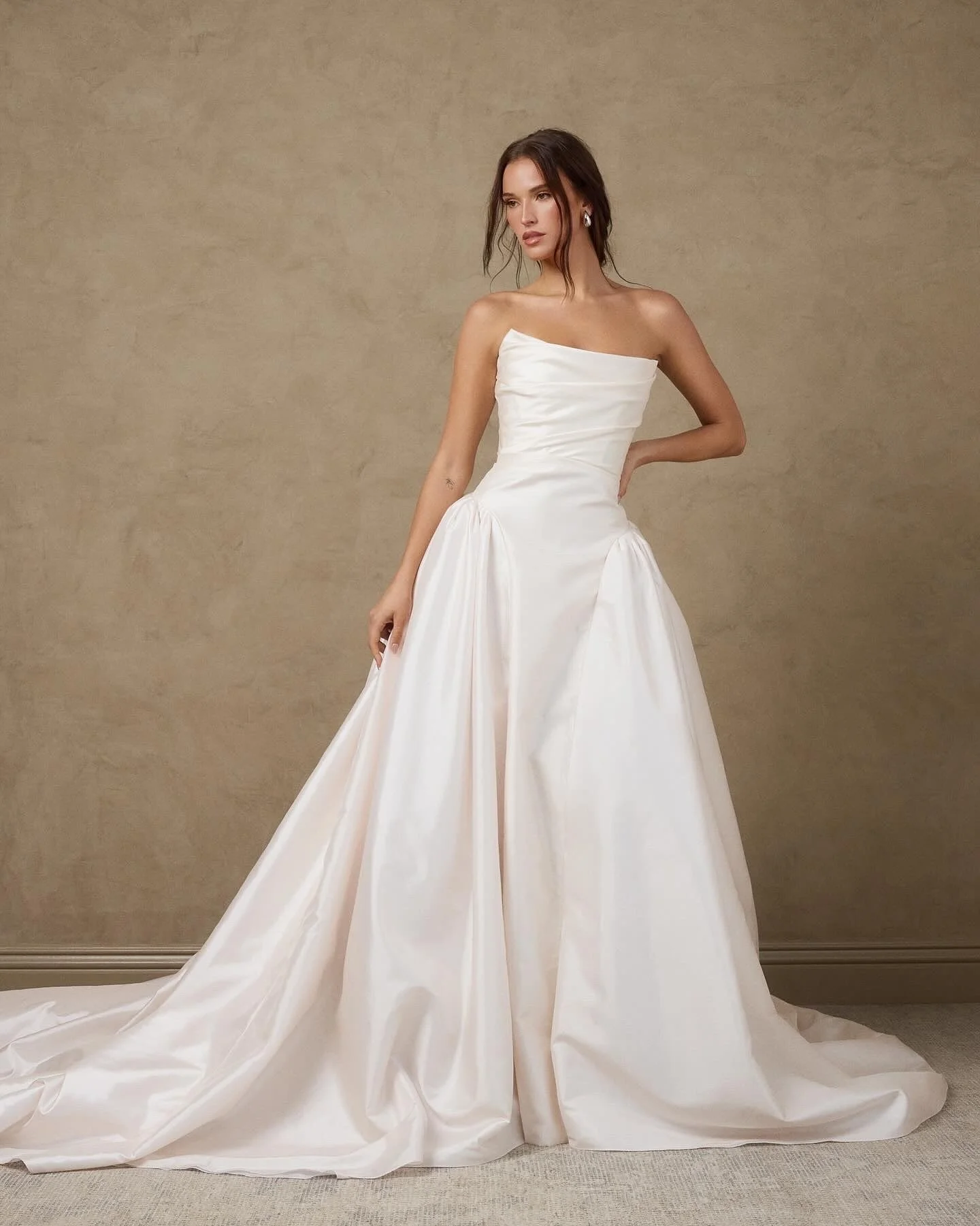 The Eloise Gown by @katherinetash has finally arrived in store • A grand silk taffeta ballgown, in the softest rose color.  She is a beautiful new addition to our collection!
Book your private fitting to try her & our @katherinetash collect