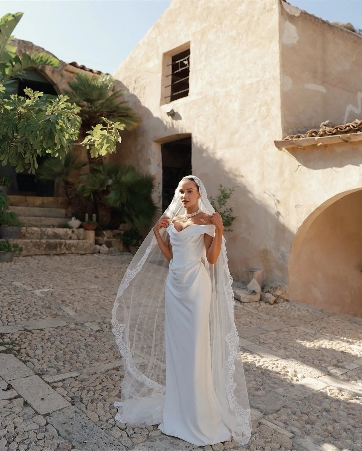 REAL BRIDE | Katia @katiaerokhin got married to Danny wearing the Nova Cora gown by @viviennewestwood. 

@tonnaradiscopello became the setting for a cinematic wedding where rustic Italian charm met modern elegance. Once a 13th-century tuna factory, i