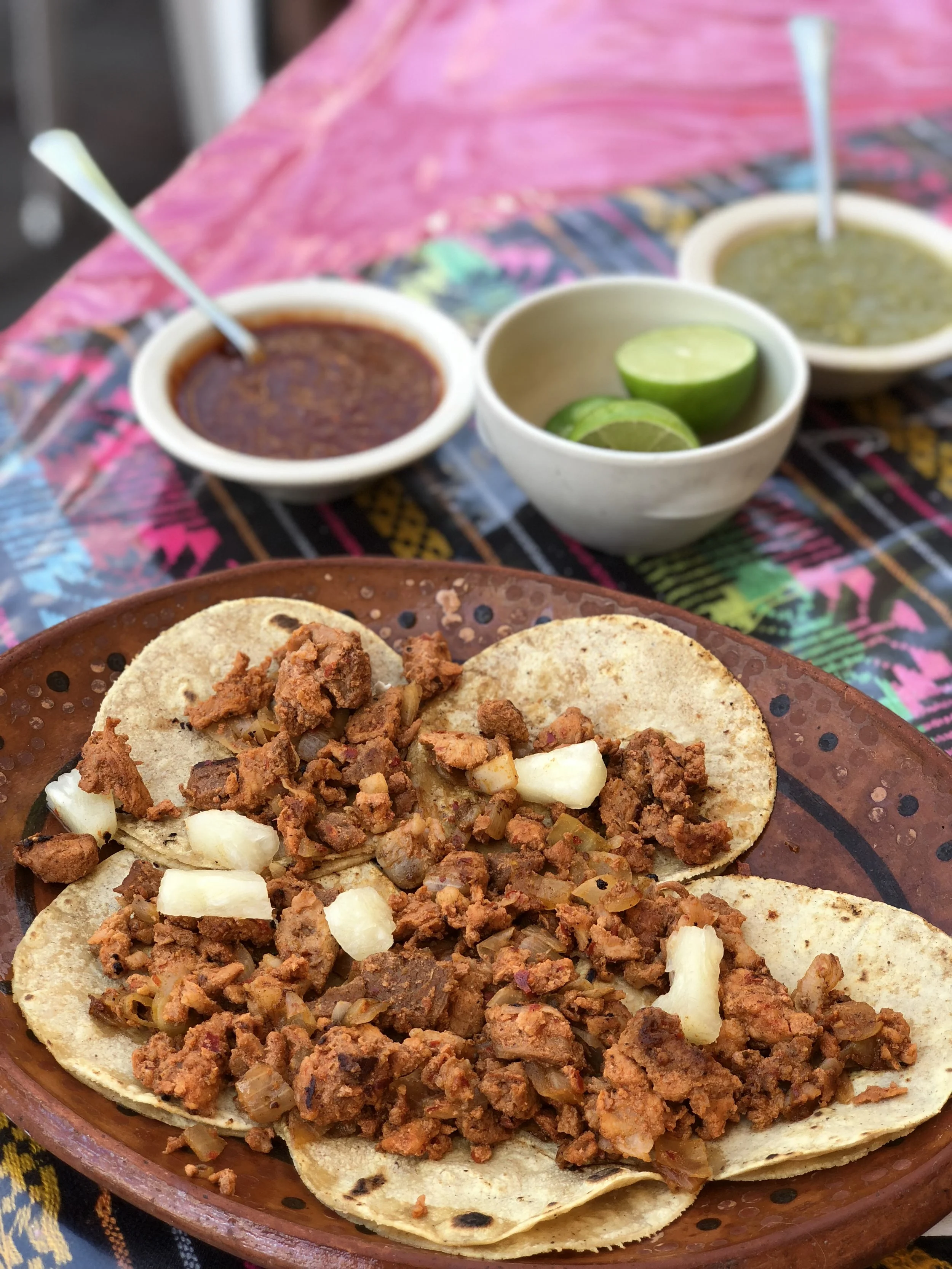 5 tacos al pastor's for 56 pesos ( that's less than $3 USD for all of this!)