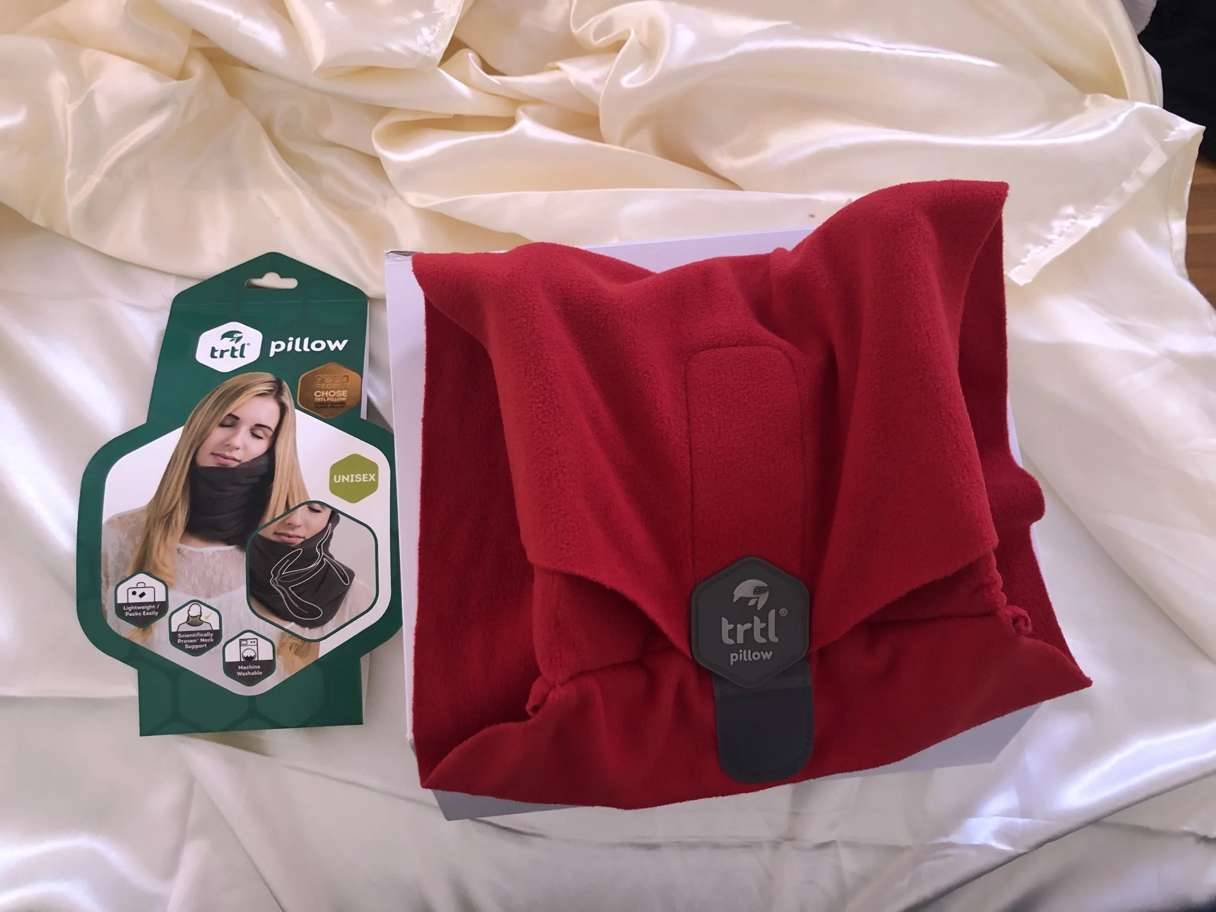 My new TRTL Travel Pillow— lifesaver during my travels