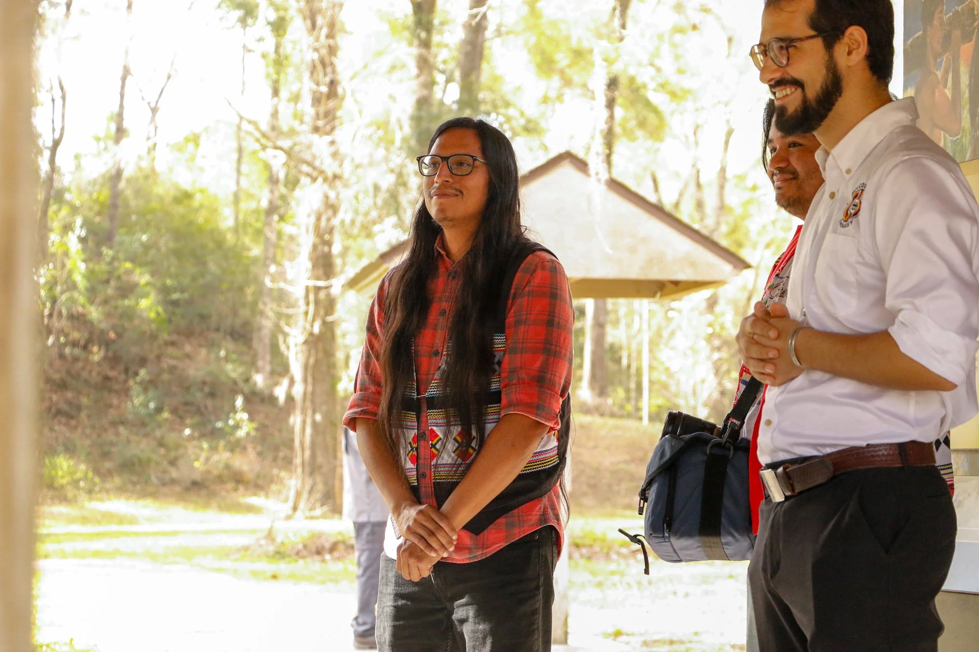 Members of the Miccosukee Tribe speaking to an audience.