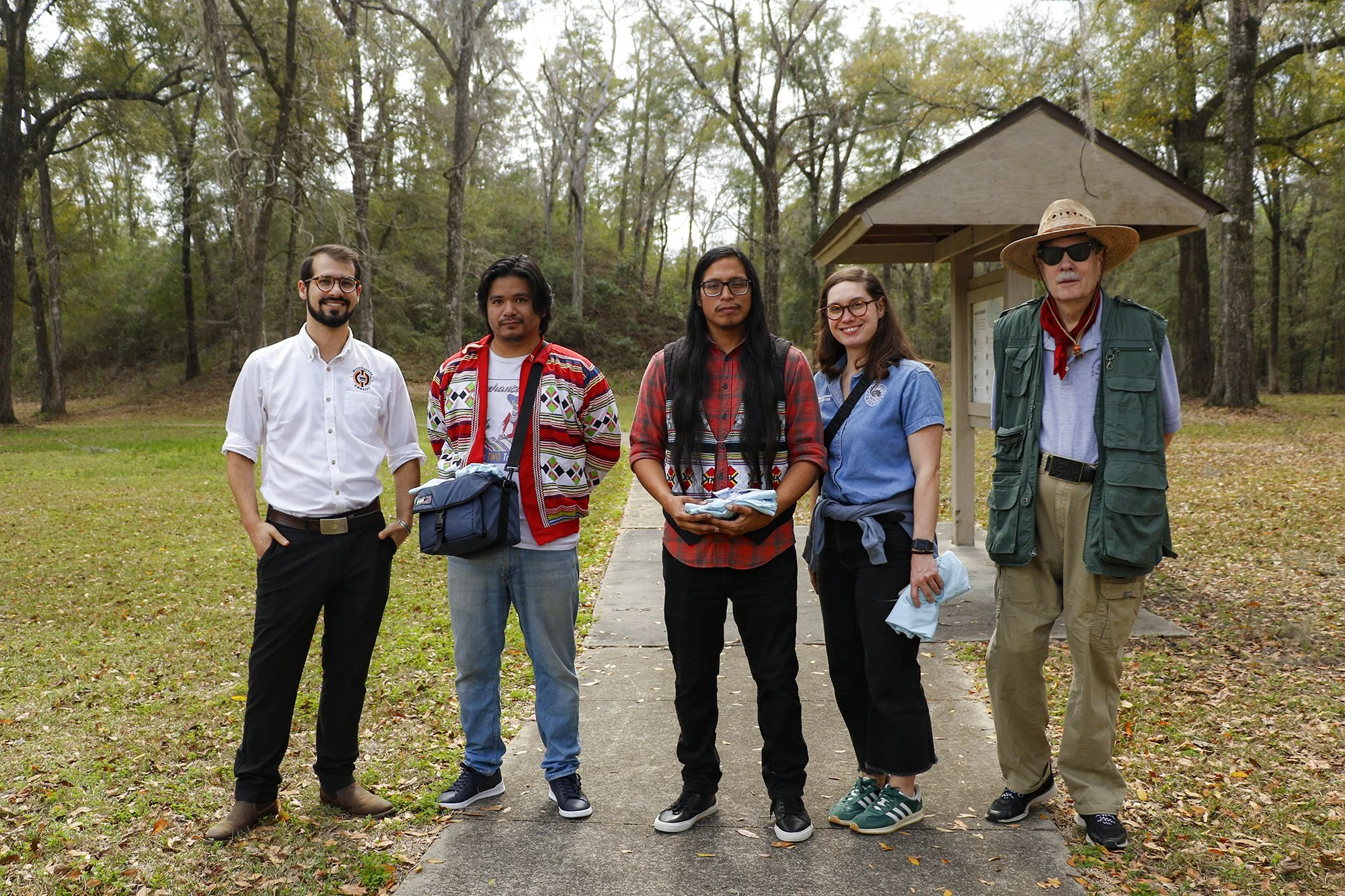 Members of the Miccosukee Tribe with THS personnel.