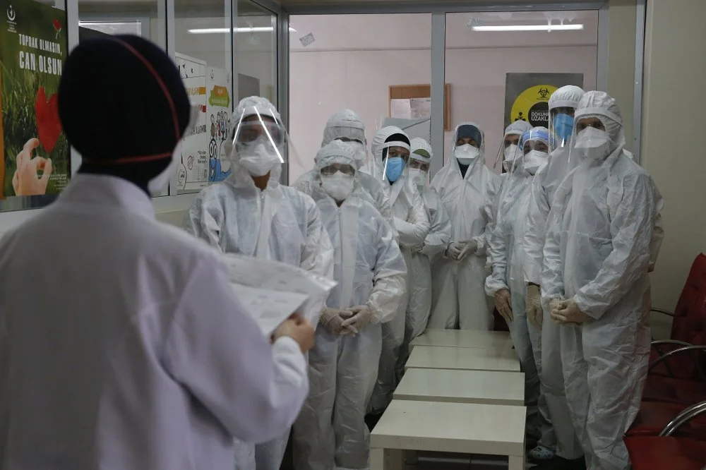 Turkey’s pandemic strategy hinges on hazmat-suited gumshoes
