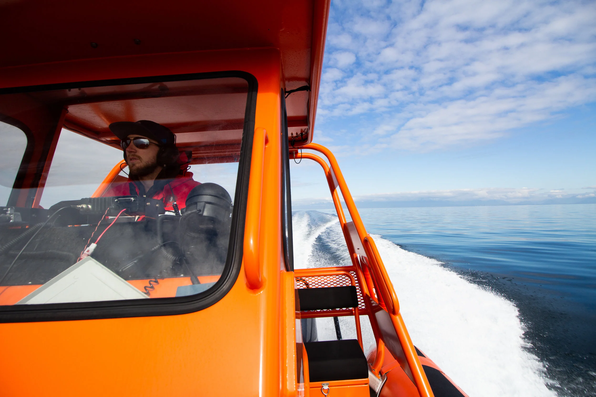 Captain James at the helm. Photo by Natalie Reichenbacher