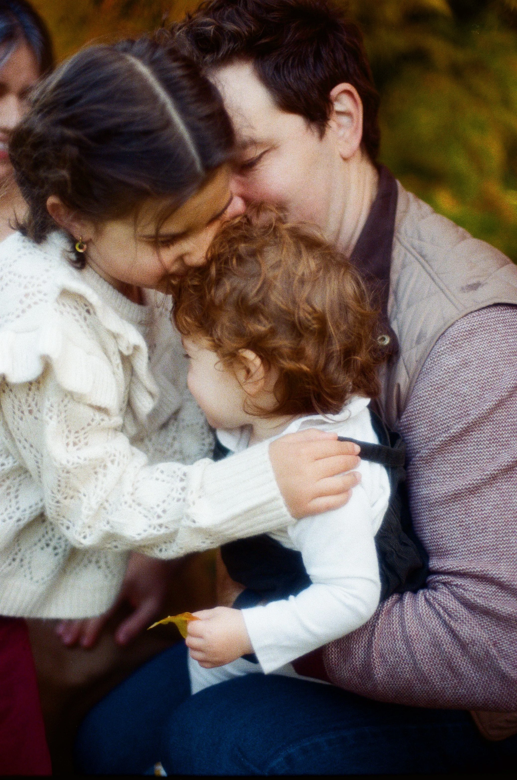 Seattle family portrait taken in the fall with soft light, natural connection, and seasonal colors.