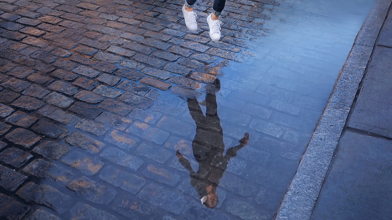 individual hovers above puddle about to splash triumphantly, individual therapy, life coach counseling