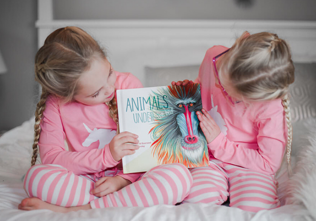 Lifestyle & Mom Blogger Portia Smith's two sweet daughters with "Animals Under the Bed!" (Photo credit: Portia Smith)