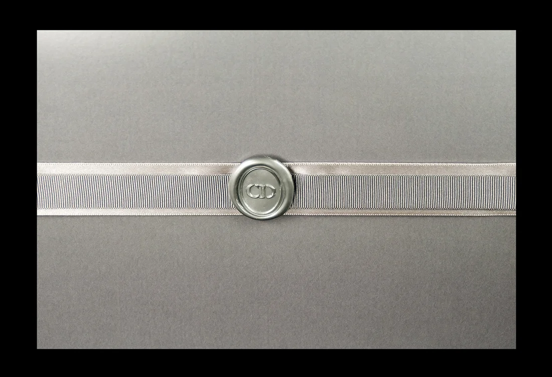 Front of menu complete with wax seal and ribbons.