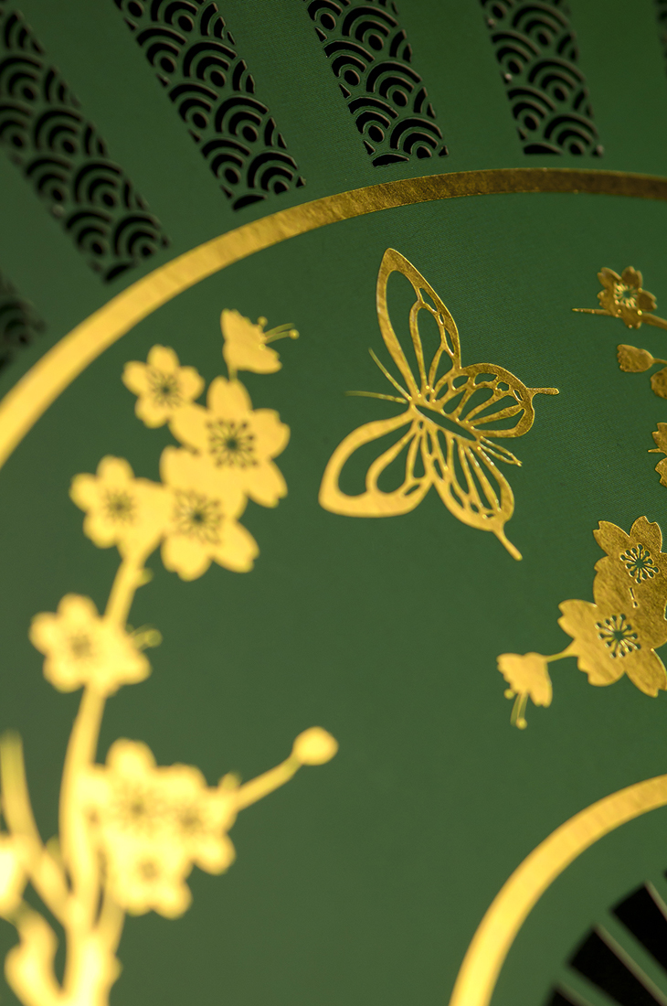Detail shot of gold foiling and laser-cutting.