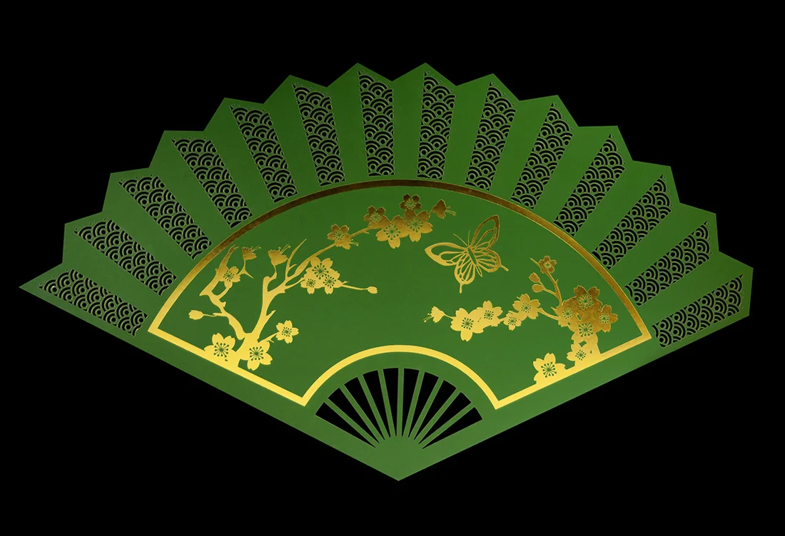 Laser-cut oriental fan menu for Madama Butterfly dinner at the Royal Opera House. Front.