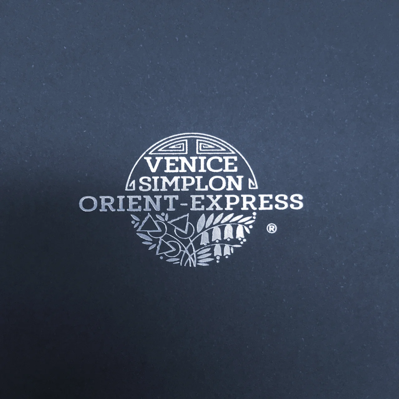 Silver foiled logo on outer cover