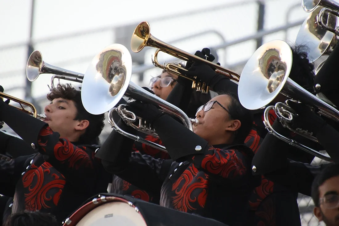 Liberty Redhawks brass players performing