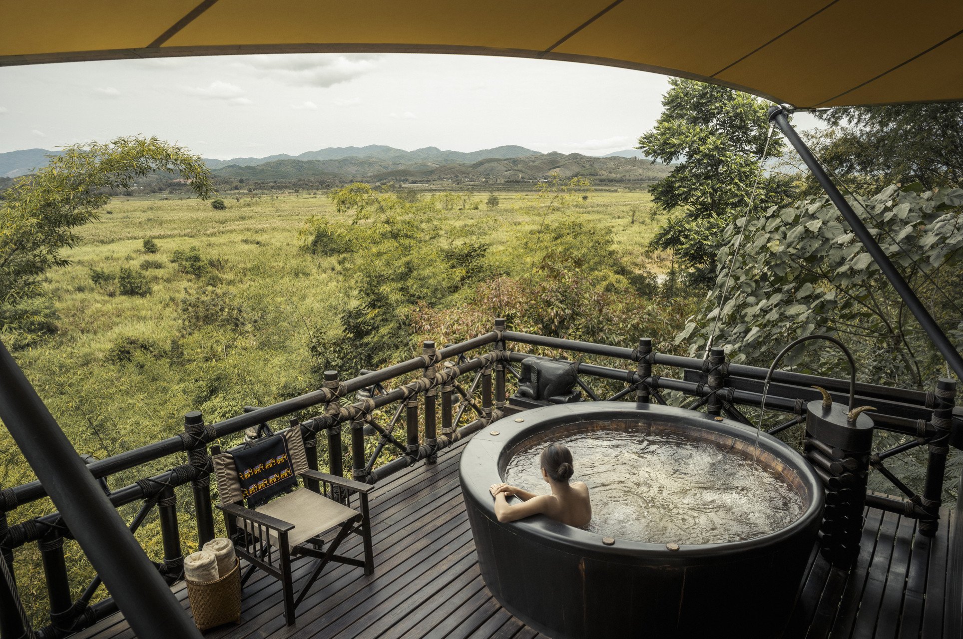 Tub on the deck of the luxury tent at Four Seasons Tented Camp Golden Triangle