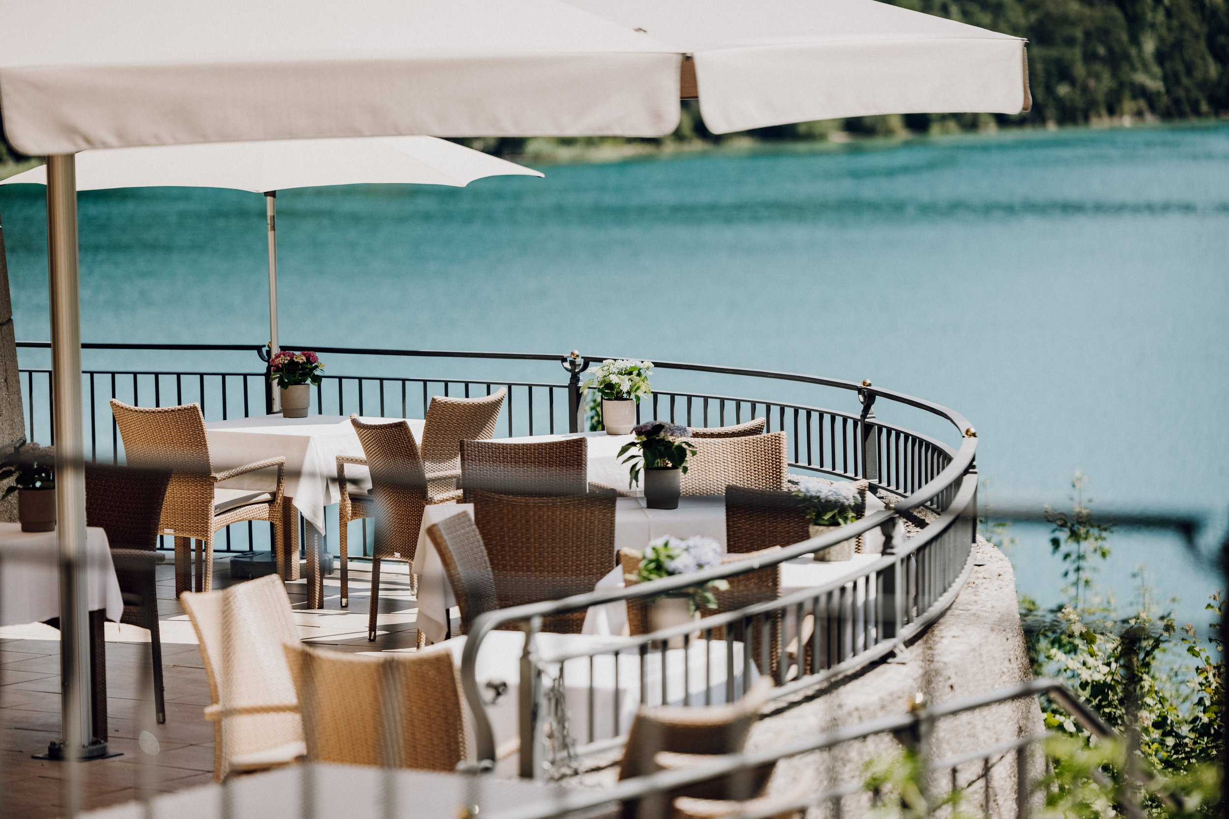 Dining overlooking Lake Fuschl at the Beach Club at Schloss Fuschl, a hotel in the Marriott Luxury Collection in Salzburg, Austria