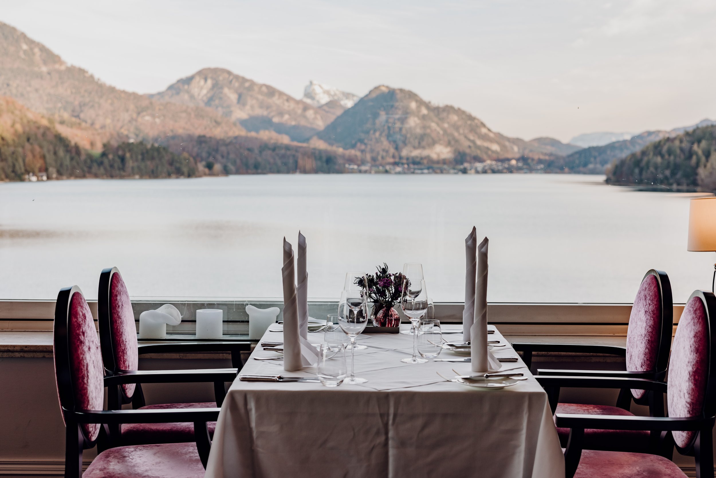 Dining overlooking Lake Fuschl at Schloss Fuschl, a hotel in the Marriott Luxury Collection in Salzburg, Austria