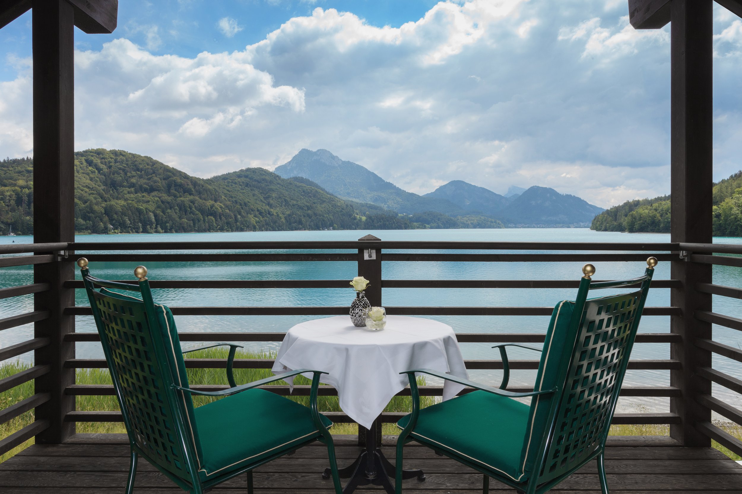 Dining overlooking Lake Fuschl at Schloss Fuschl, a hotel in the Marriott Luxury Collection in Salzburg, Austria