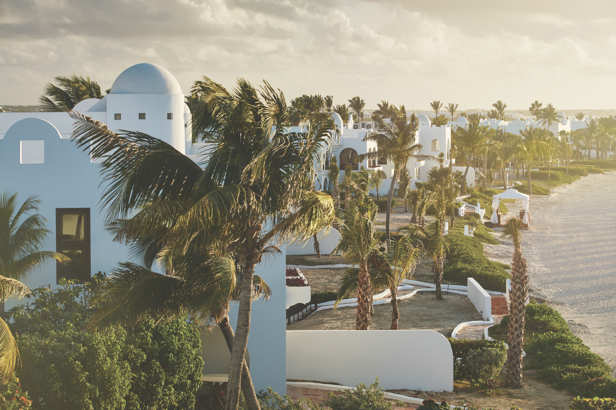 White-washed villas and sandy beach at Belmond Cap Juluca on Anguilla