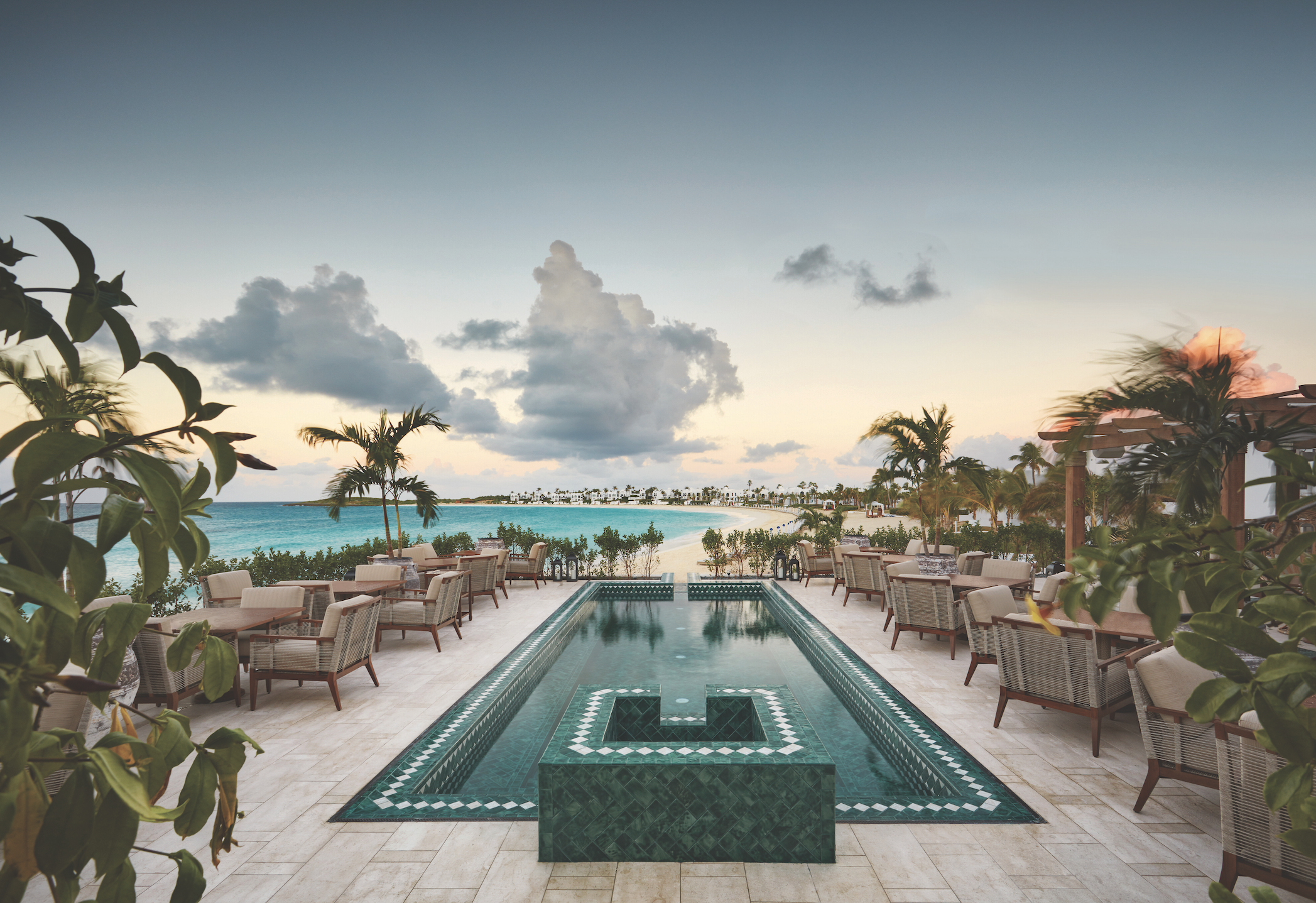 Infinity pool and beach views at Cap Juluca, a Belmond Hotel in Anguilla