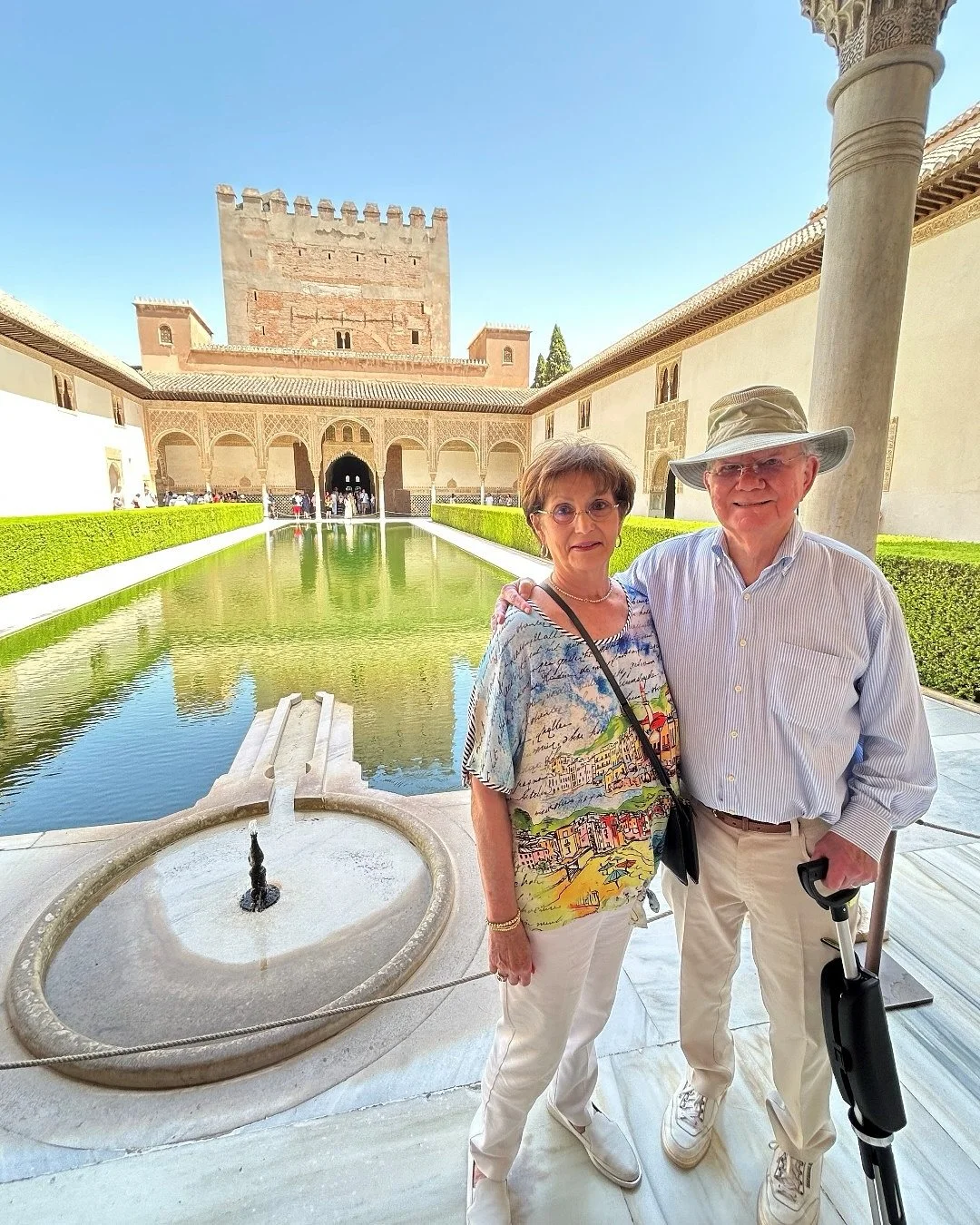 Some of our beloved clients, Cloud and Nancy, recently spent some time exploring Spain. Here they are at the Alhambra in Granada and the Royal Palace in Madrid. They even got to meet up with two of their grandchildren for lunch in Paris before they h